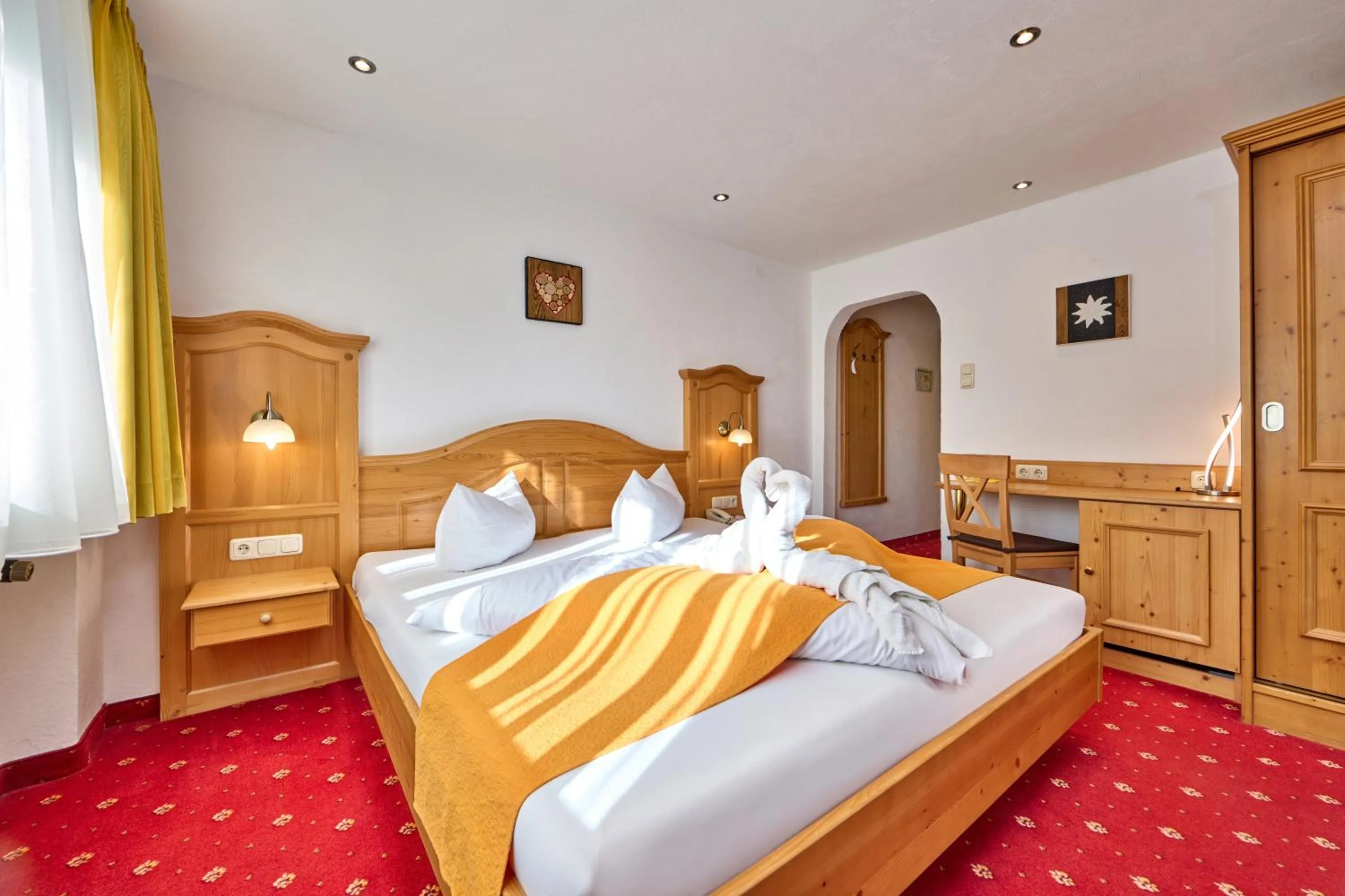 Bed in Alpenhotel Rieger