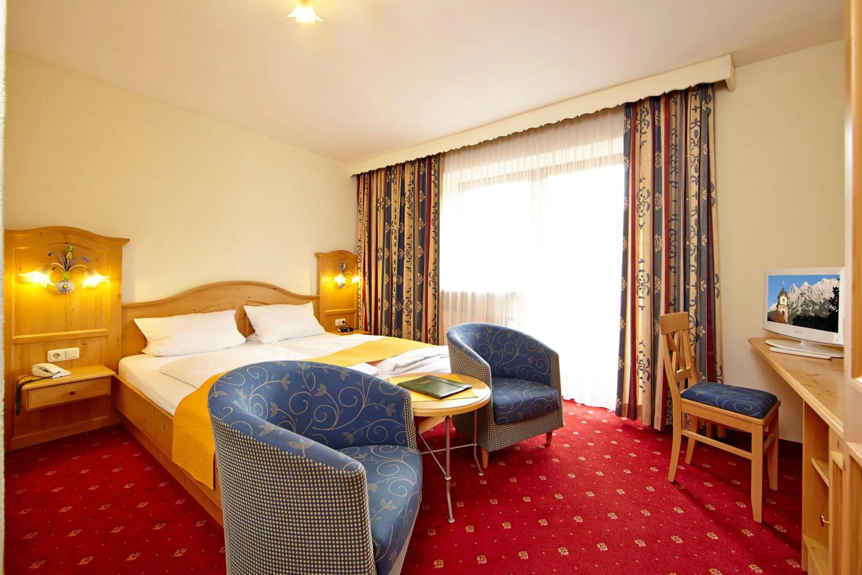 Photo of the whole room, Bed in Alpenhotel Rieger