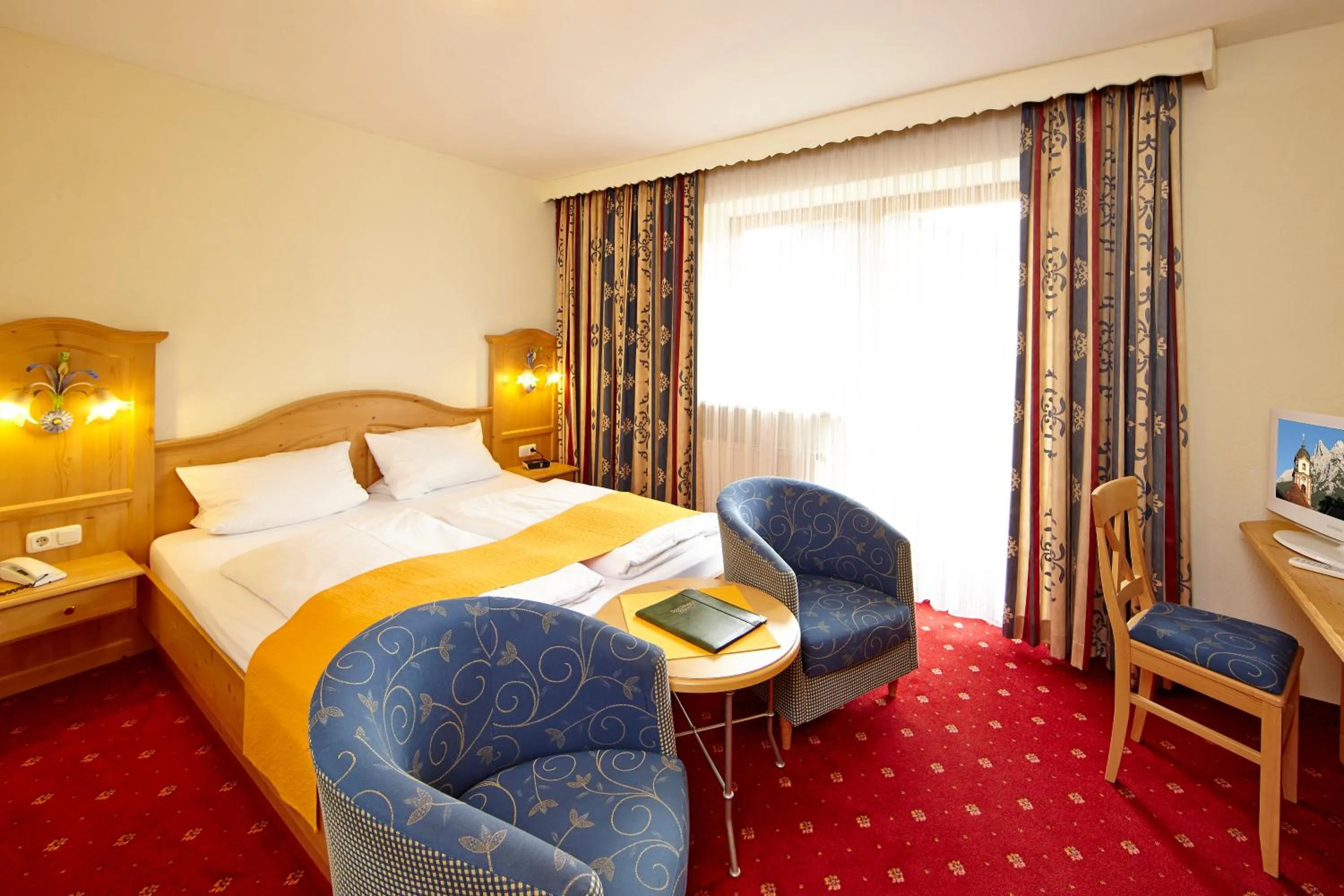 Photo of the whole room, Bed in Alpenhotel Rieger