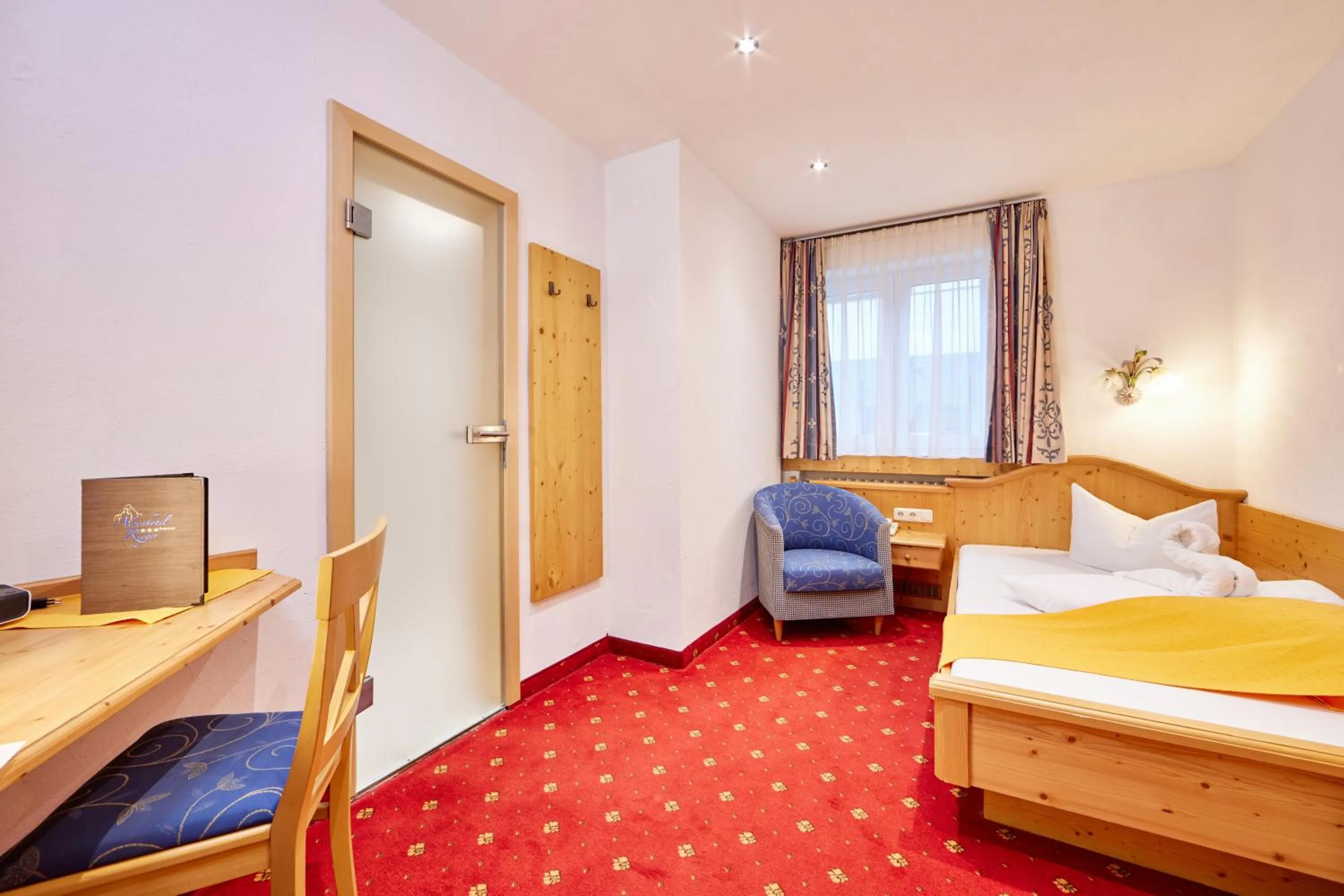 Bed in Alpenhotel Rieger