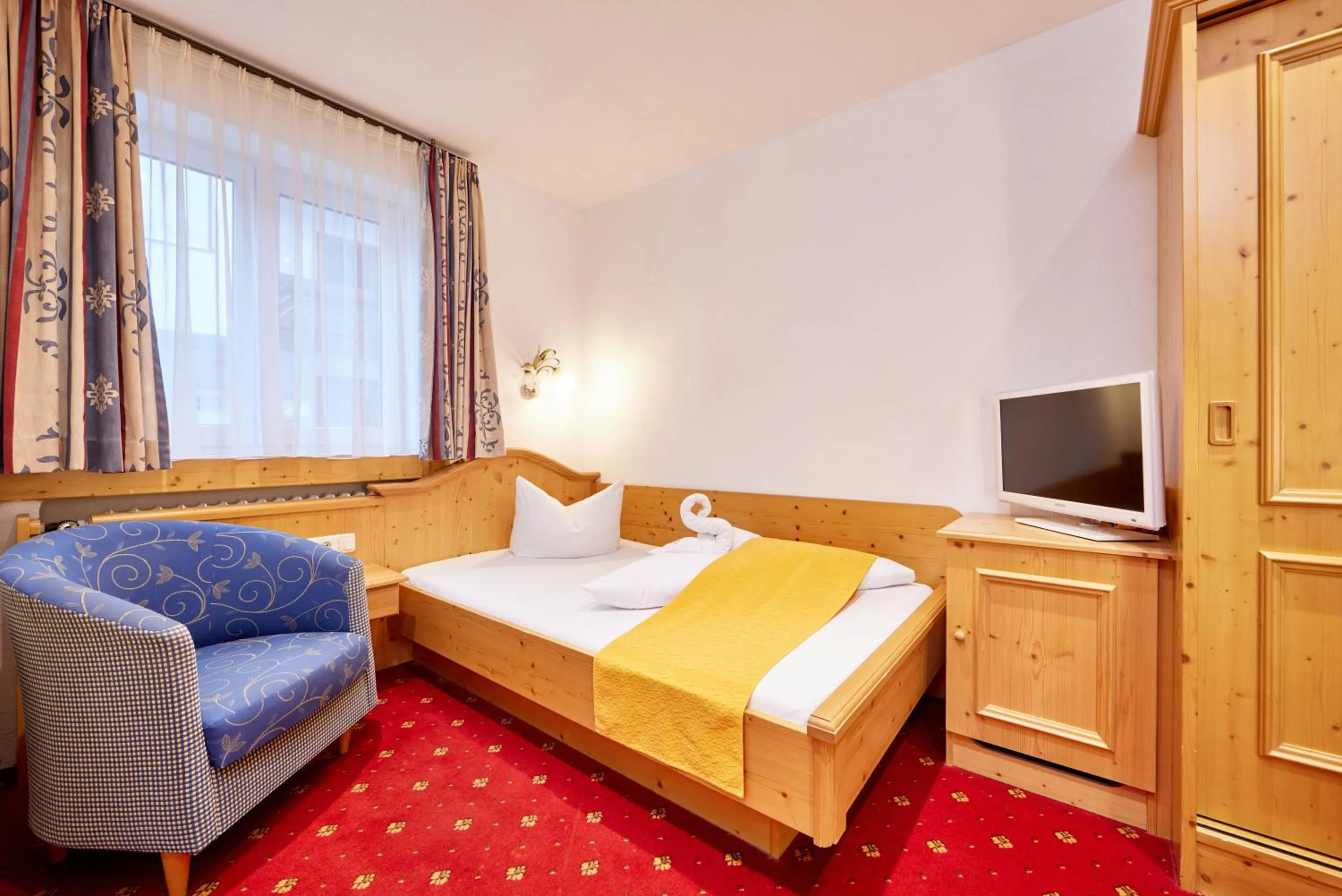 Bed in Alpenhotel Rieger