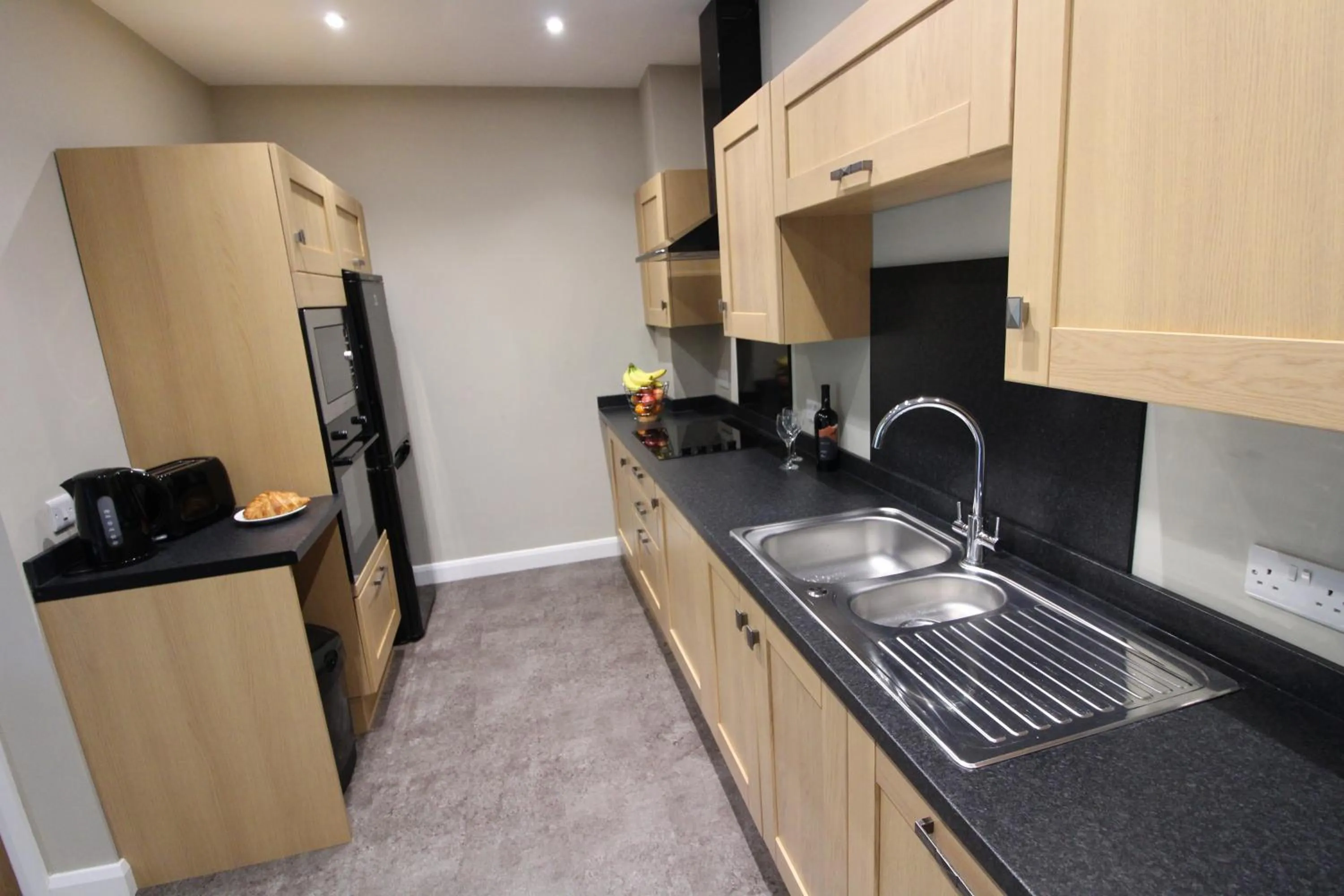 Kitchen or kitchenette in Plawsworth Hall Serviced Cottages and Apartments