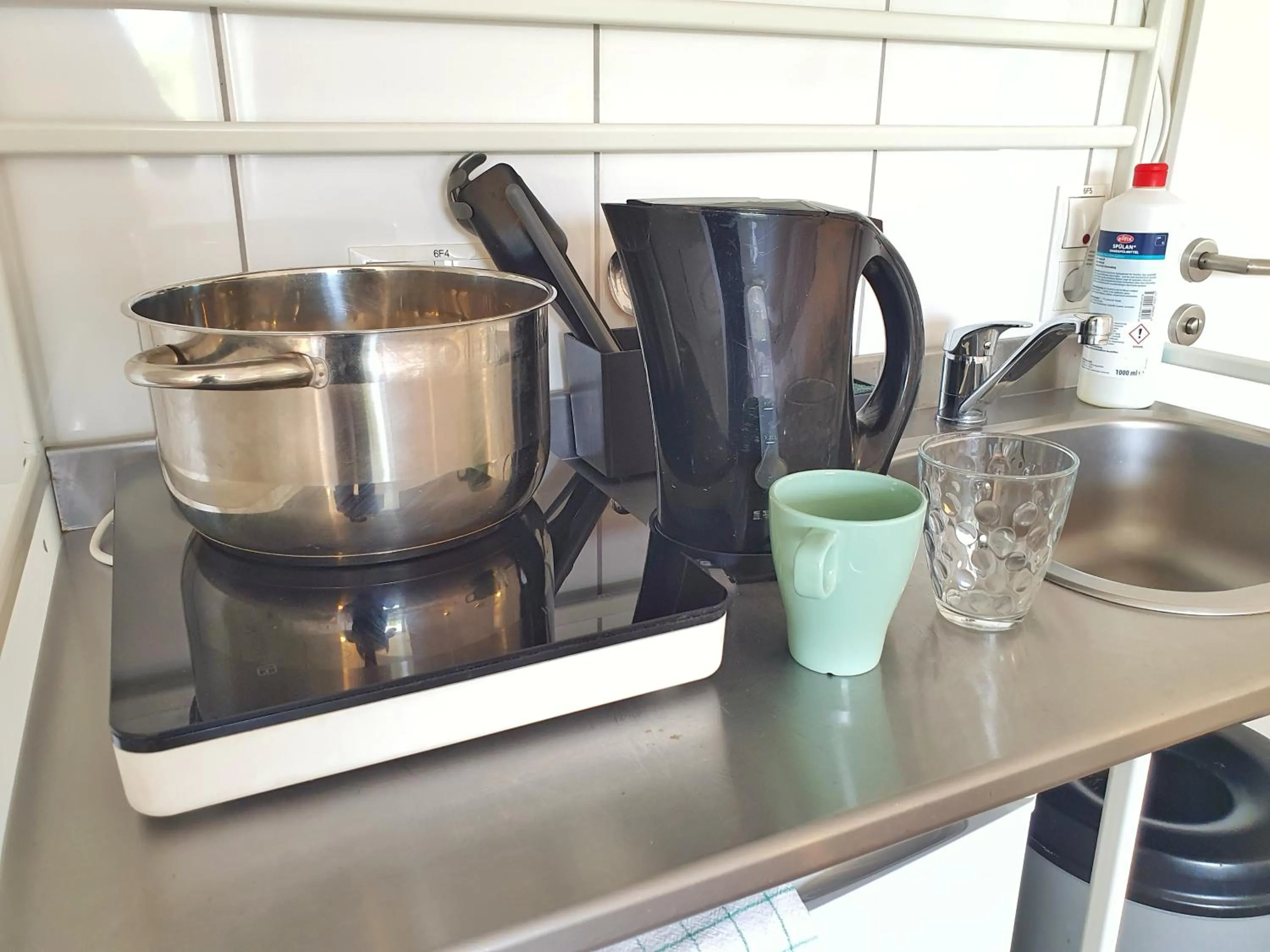 Kitchen or kitchenette in Aparthotel Jonas