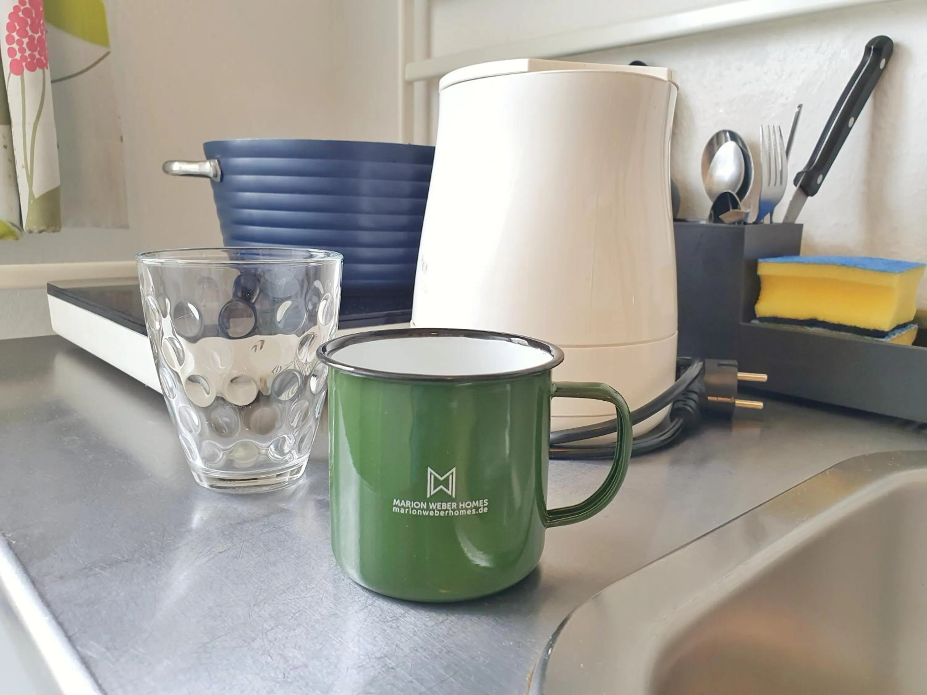 Kitchen or kitchenette in Aparthotel Jonas