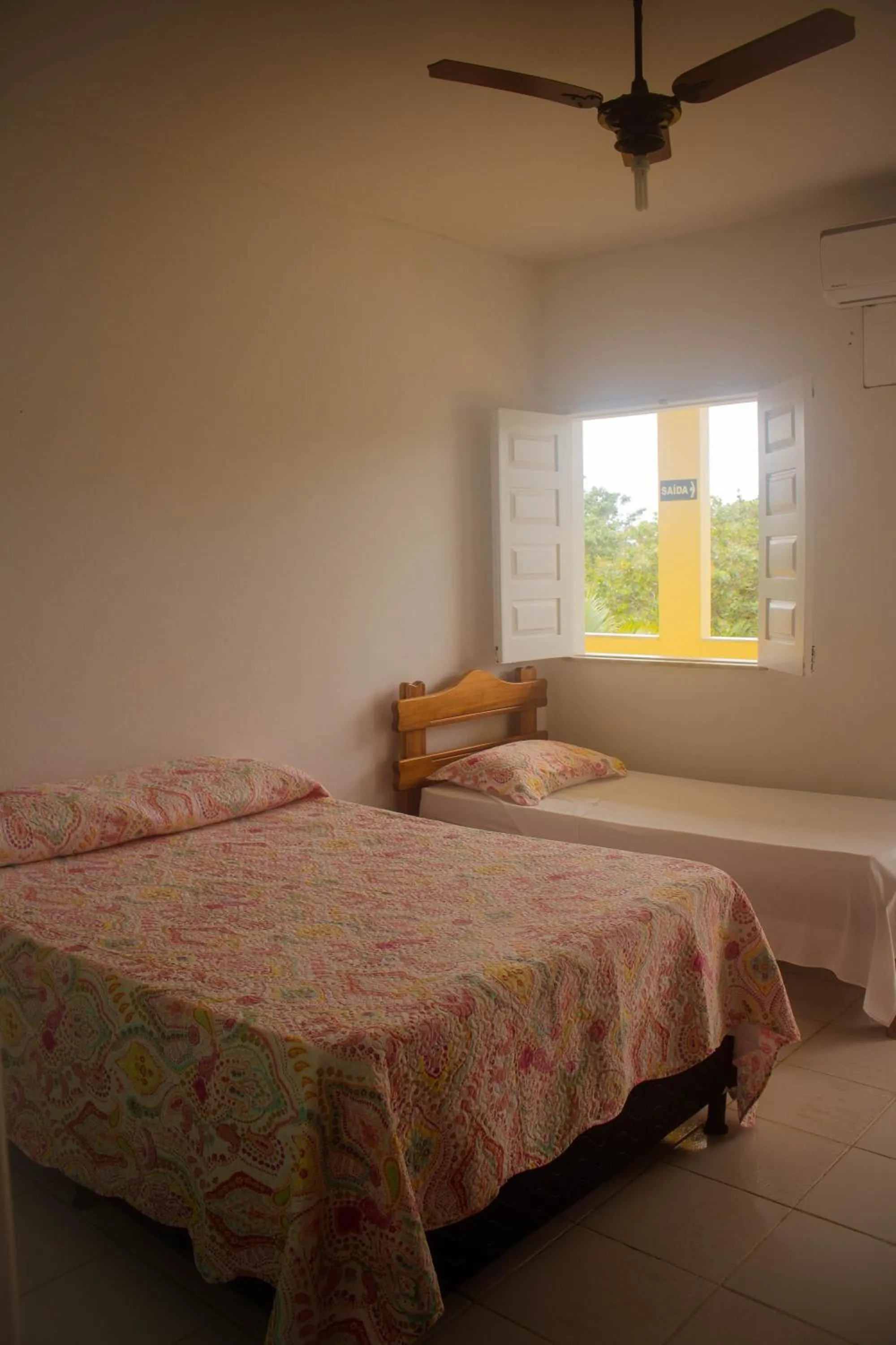 Bed in Pousada Pau Brasil