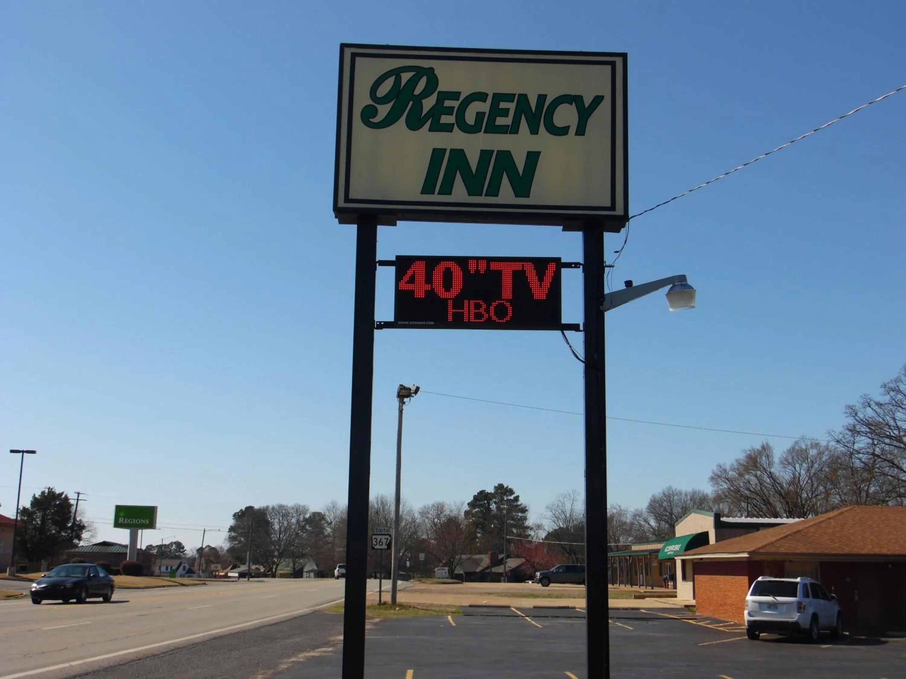 Property logo or sign in Regency Inn Bald Knob