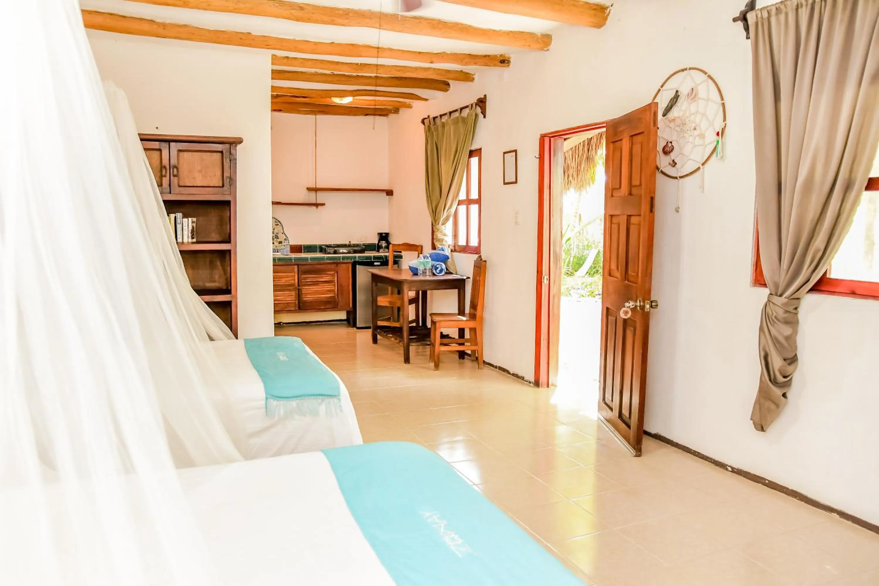 Photo of the whole room, Bed in Zomay Beachfront Holbox