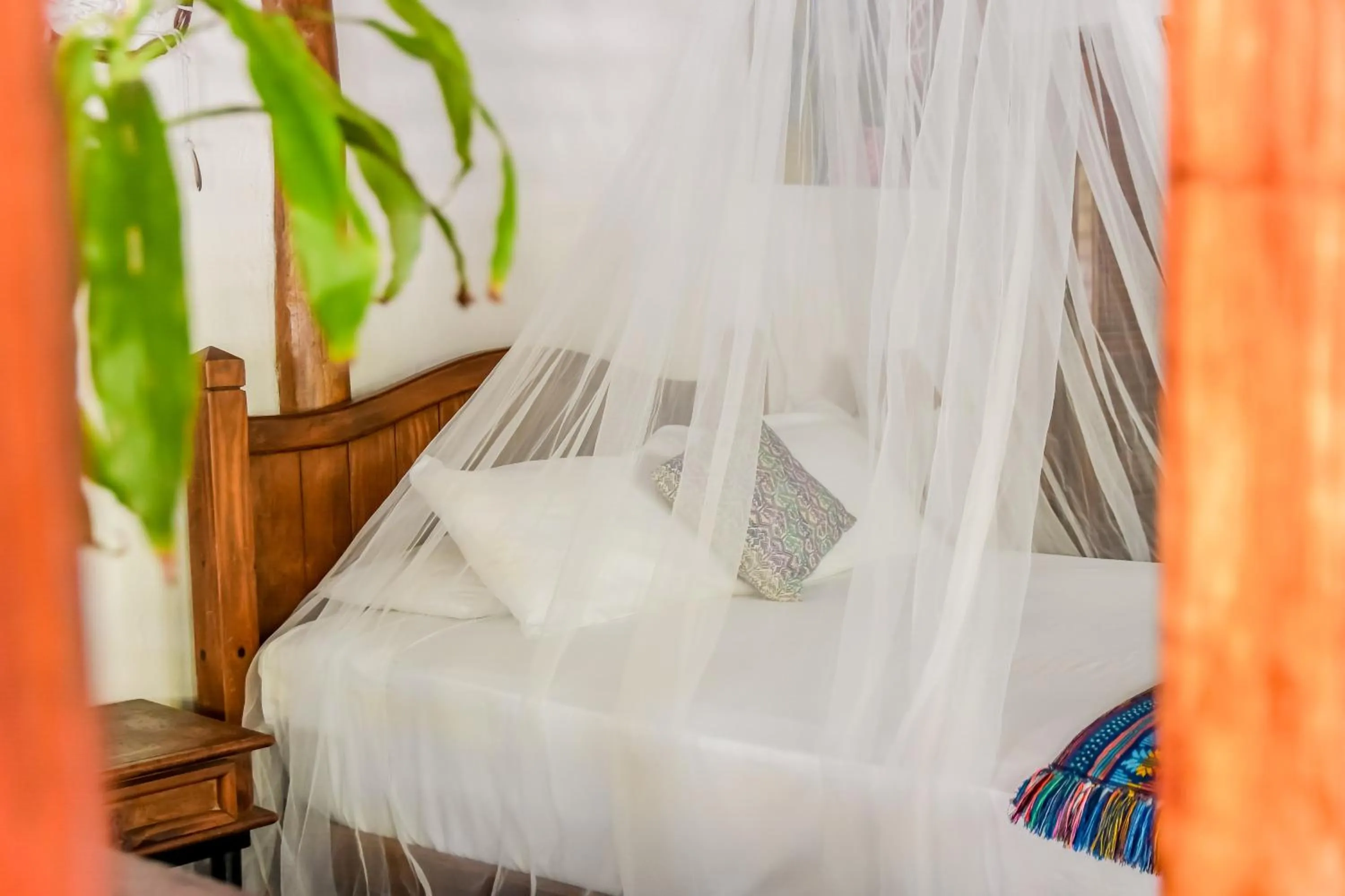 Bed in Zomay Beachfront Holbox