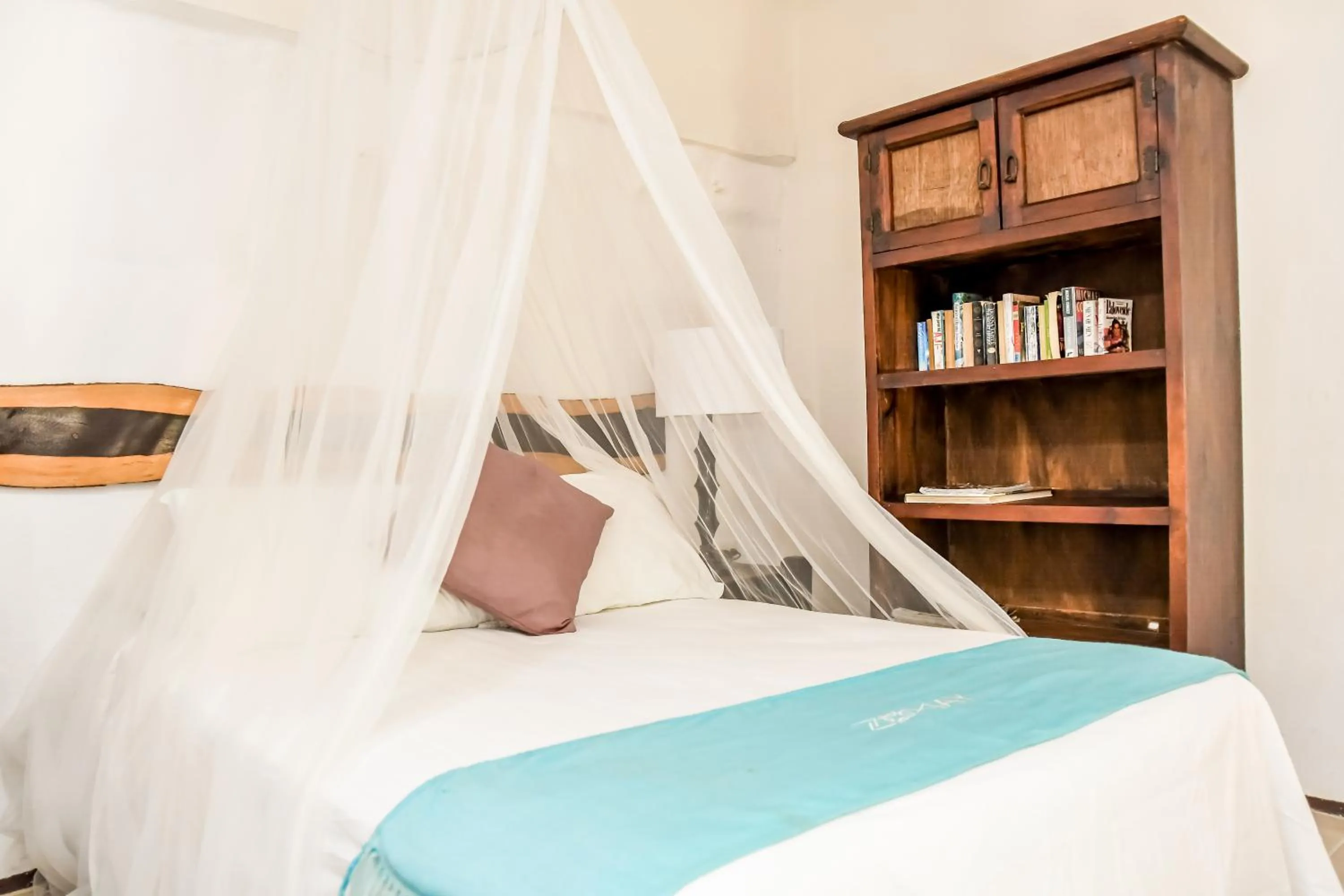 Bed in Zomay Beachfront Holbox