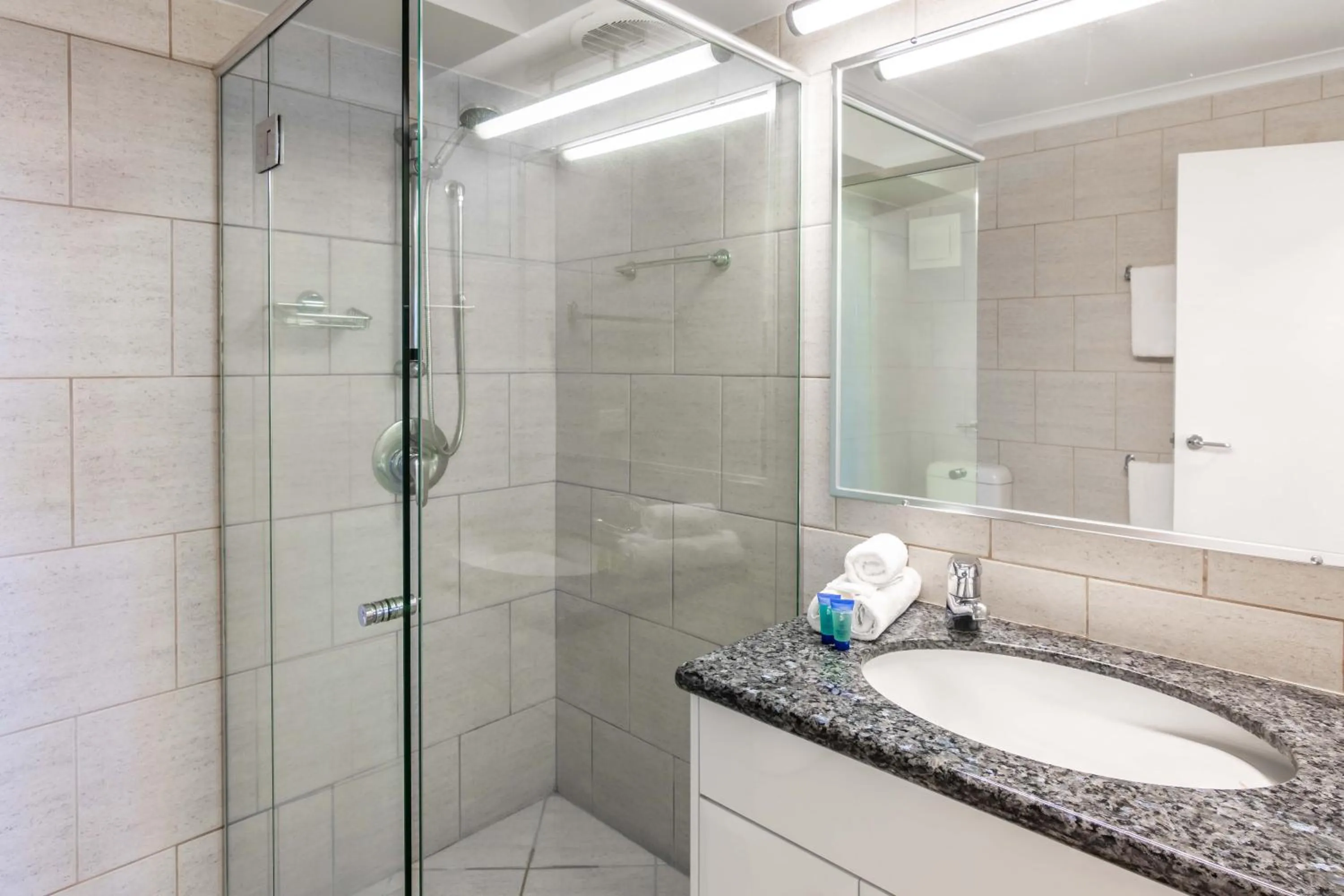 Bathroom in 84 The Spit Holiday Apartments