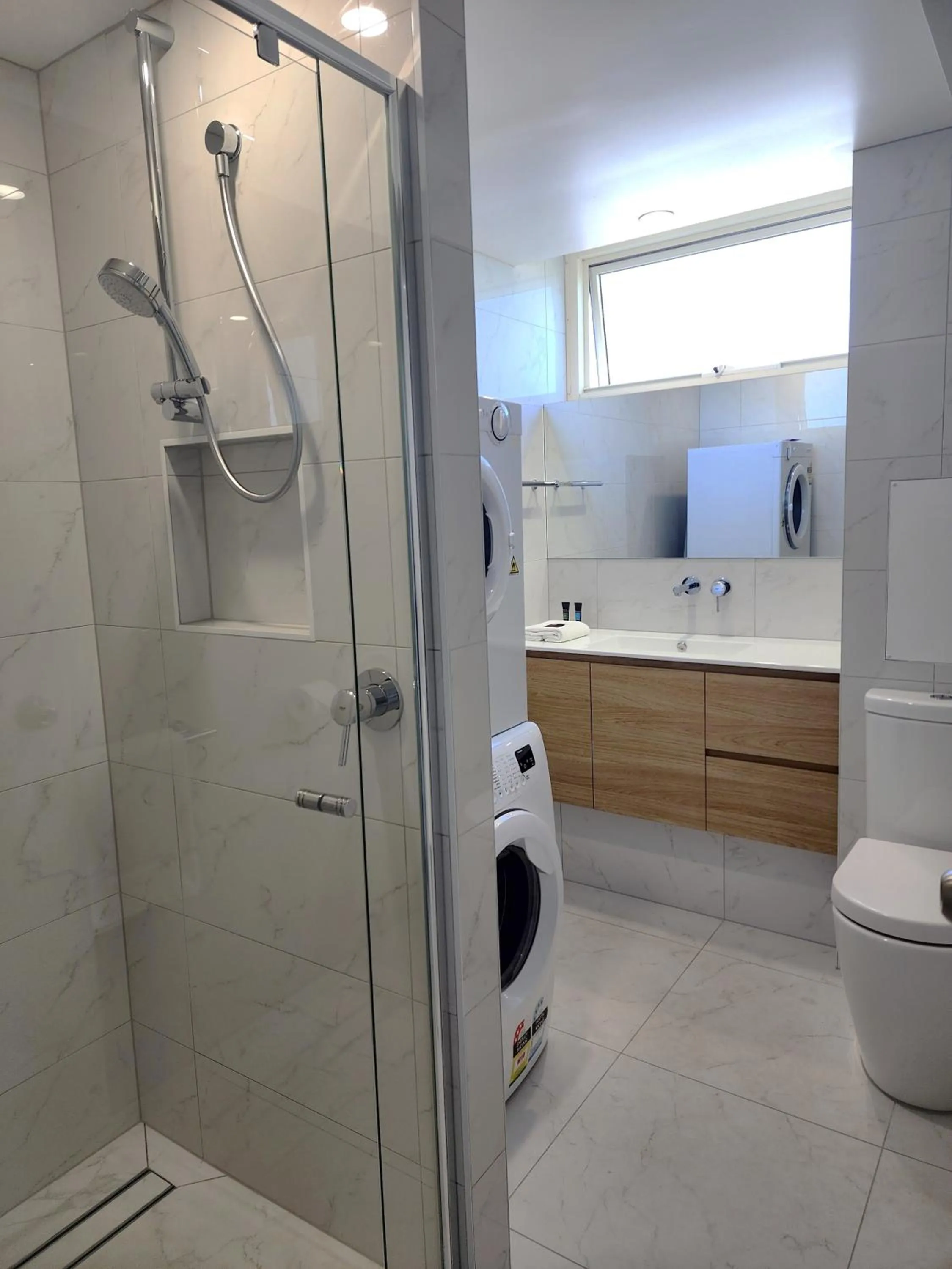 Bathroom in 84 The Spit Holiday Apartments