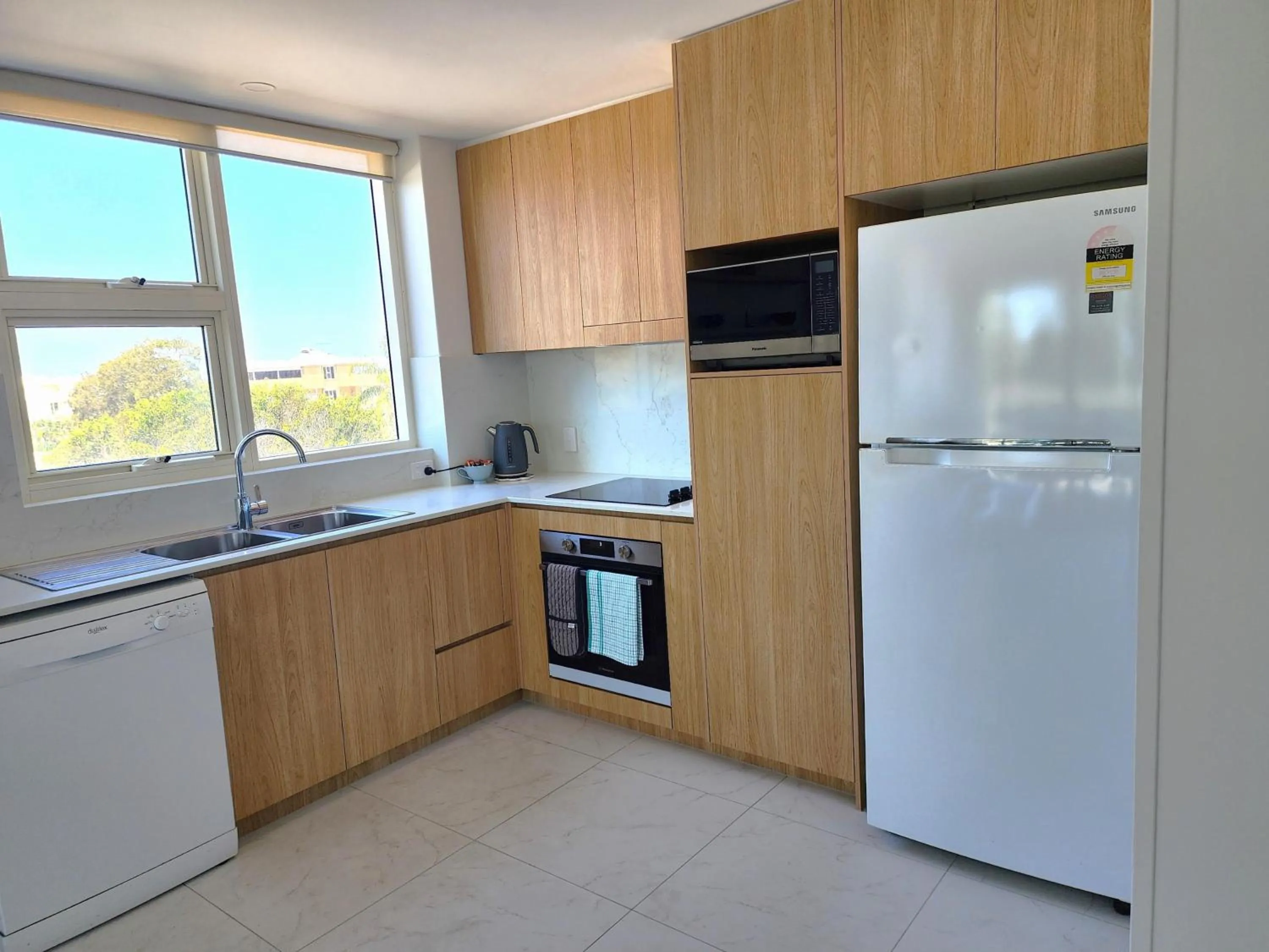 kitchen in 84 The Spit Holiday Apartments