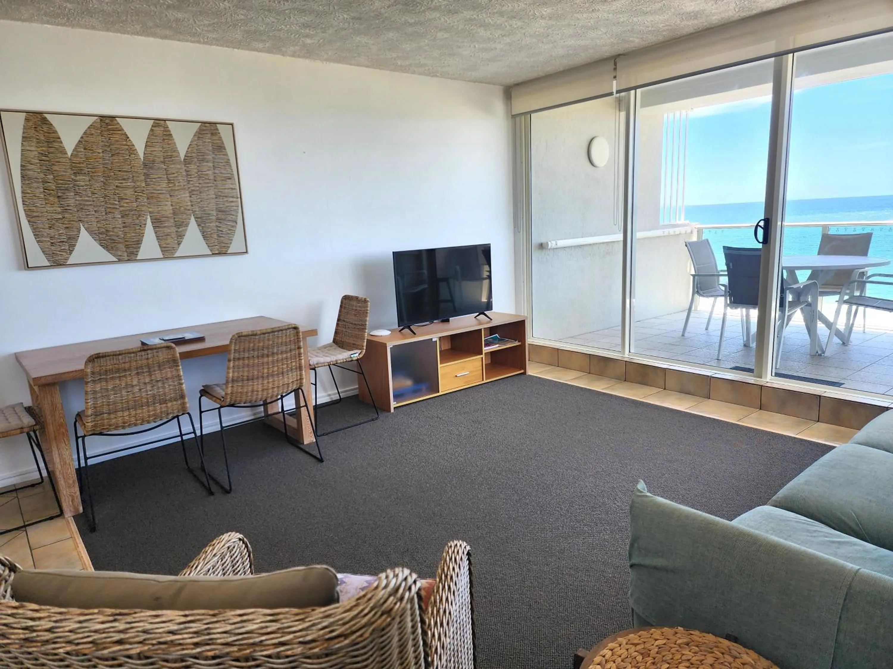 Living room in 84 The Spit Holiday Apartments