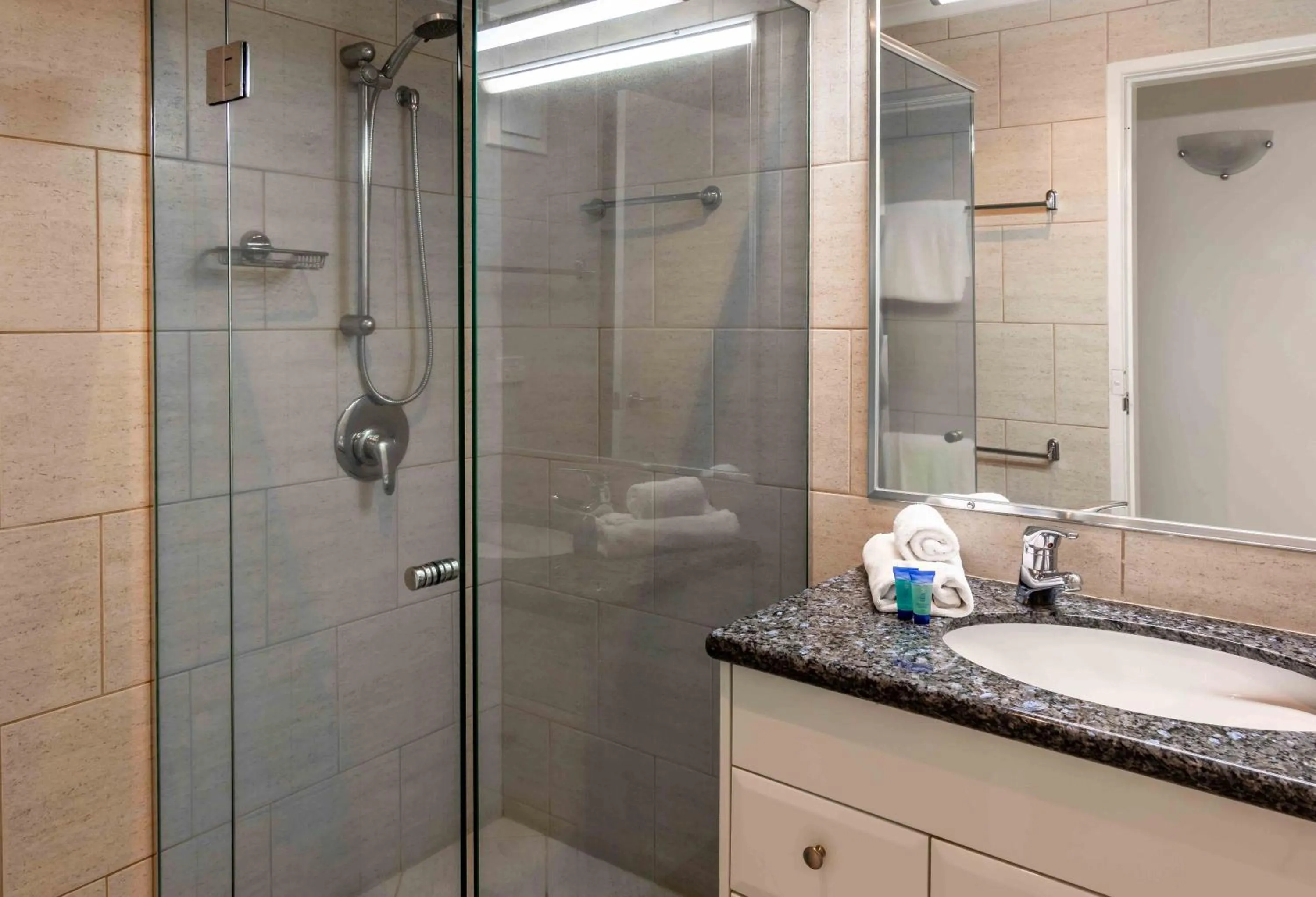 Bathroom in 84 The Spit Holiday Apartments