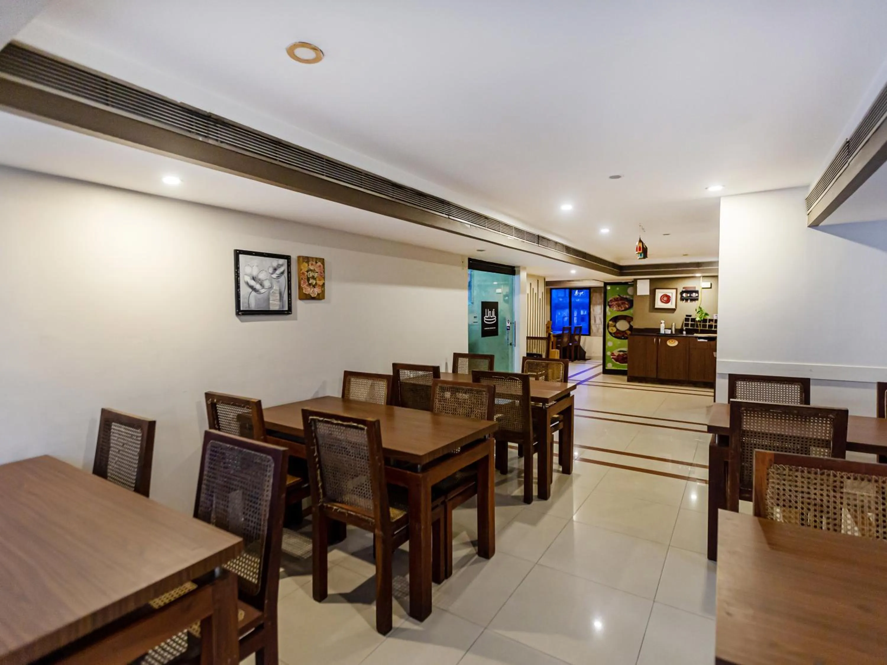 Dining area in Treebo Time Square Marine Drive