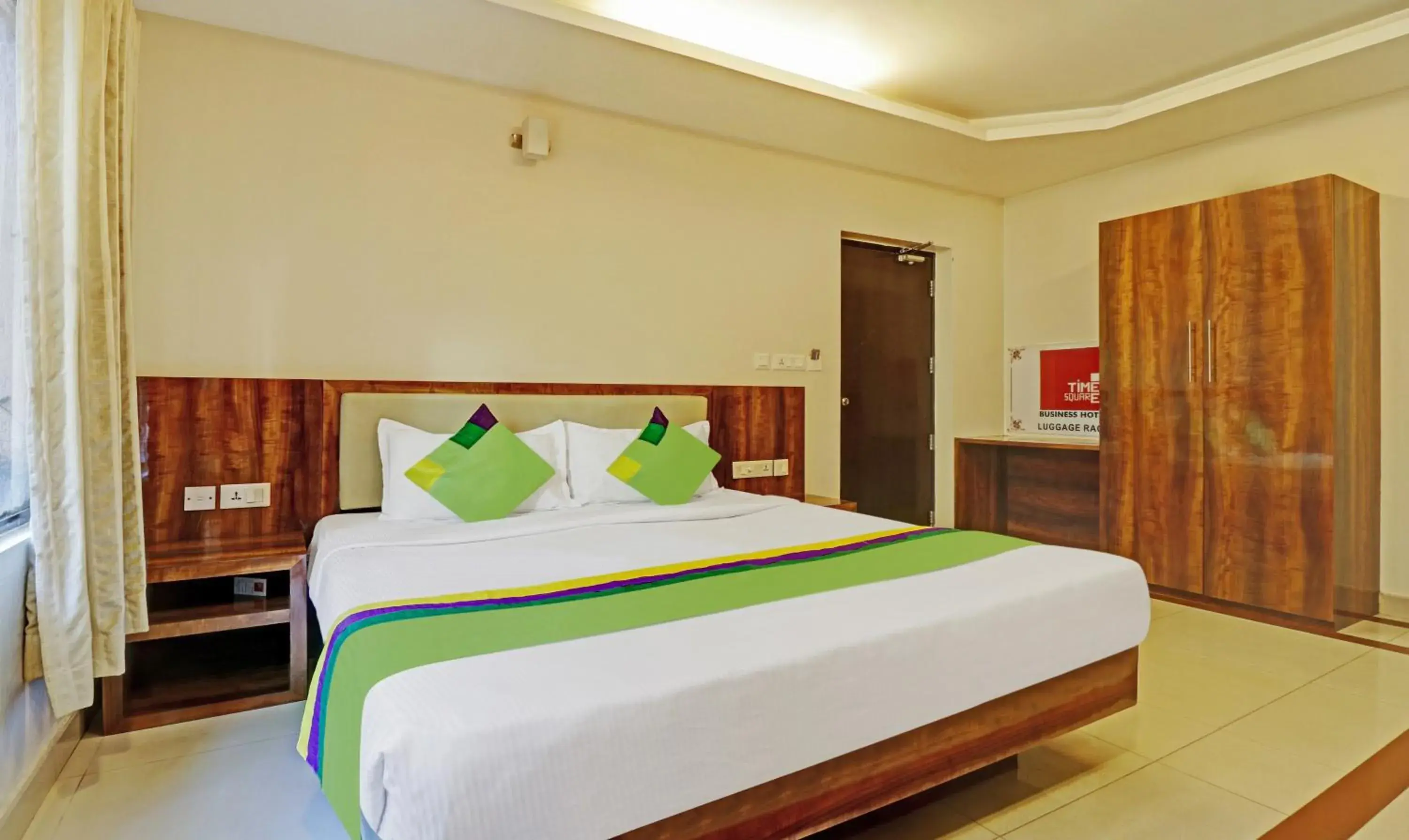 Photo of the whole room, Bed in Treebo Time Square Marine Drive Photo of the whole room, Bed in Treebo Time Square Marine Drive