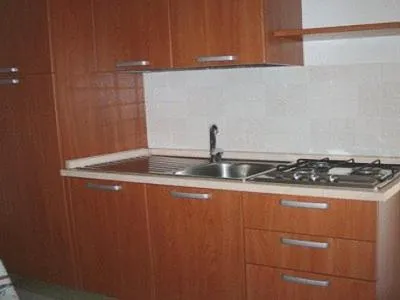 Kitchen or kitchenette in Santa Maria villaggio turistico