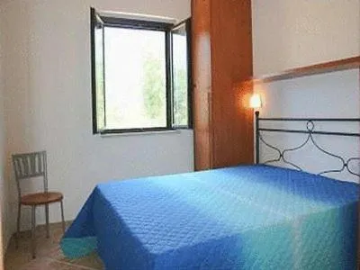Photo of the whole room, Bed in Santa Maria villaggio turistico