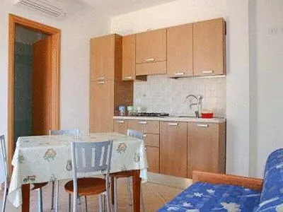 Kitchen or kitchenette in Santa Maria villaggio turistico