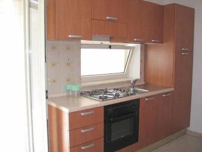 Kitchen or kitchenette in Santa Maria villaggio turistico