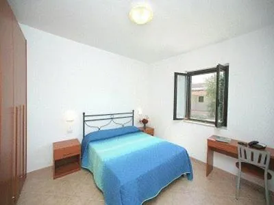 Photo of the whole room, Bed in Santa Maria villaggio turistico