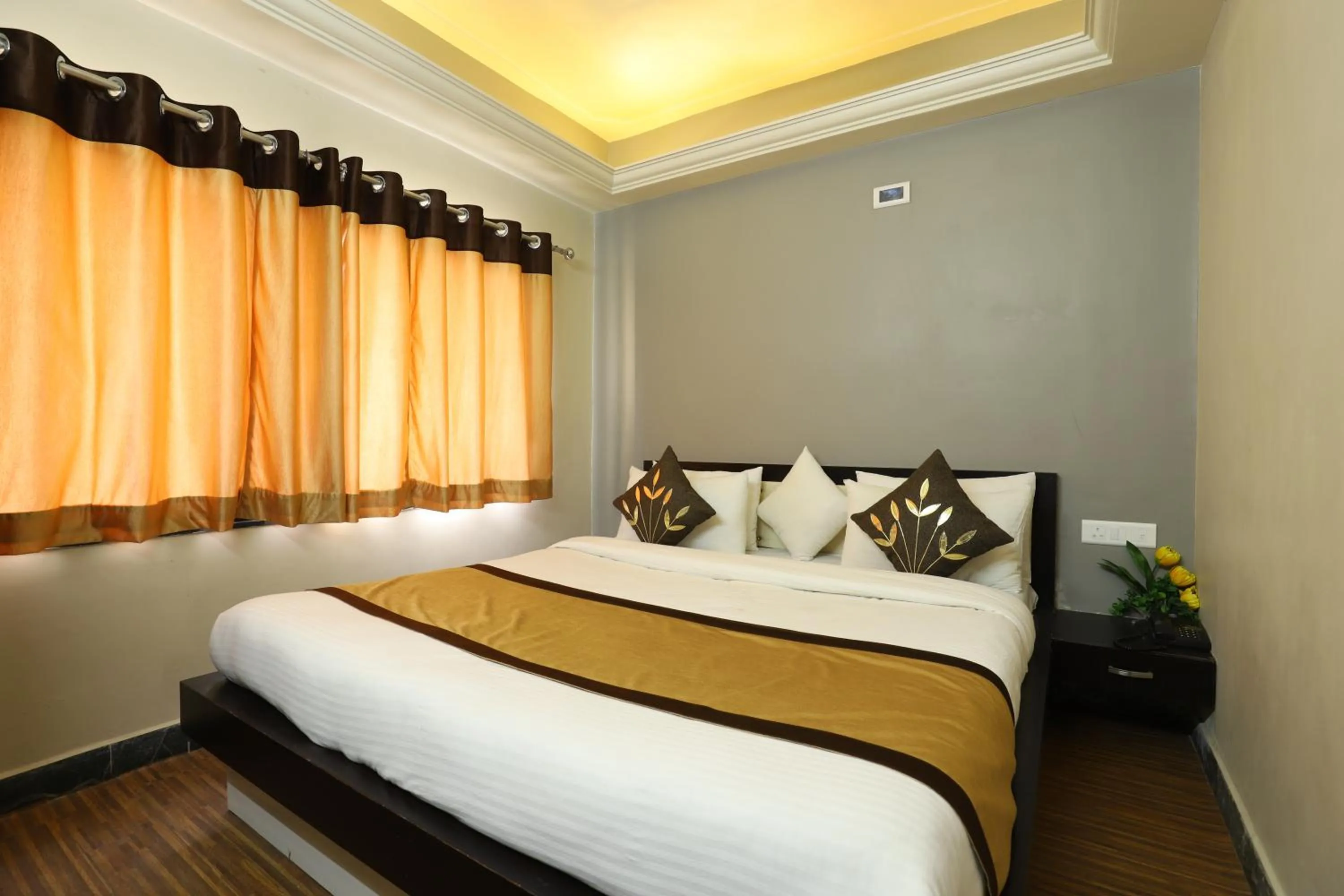 Bed in Hotel Loyal Residency
