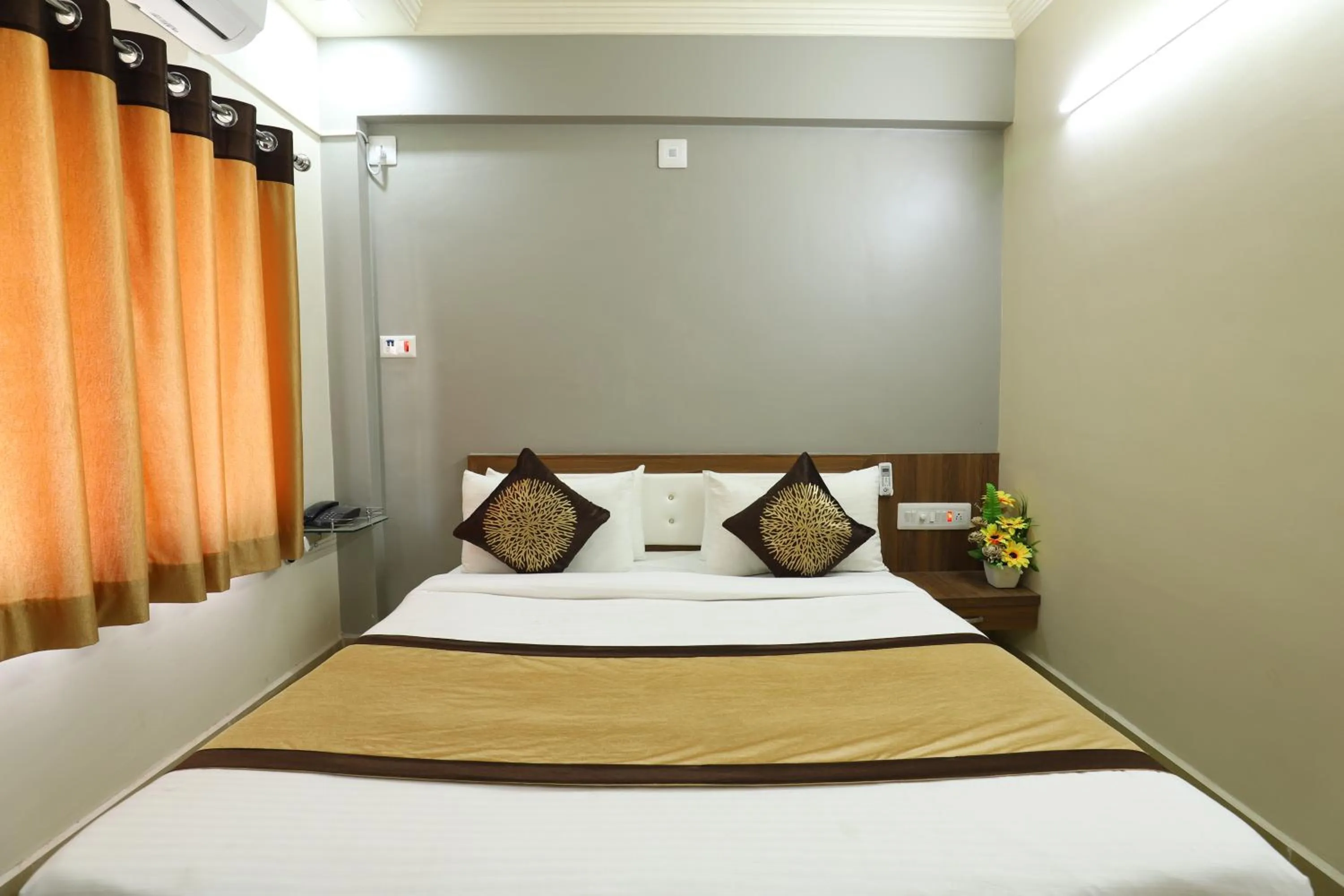 Bed in Hotel Loyal Residency