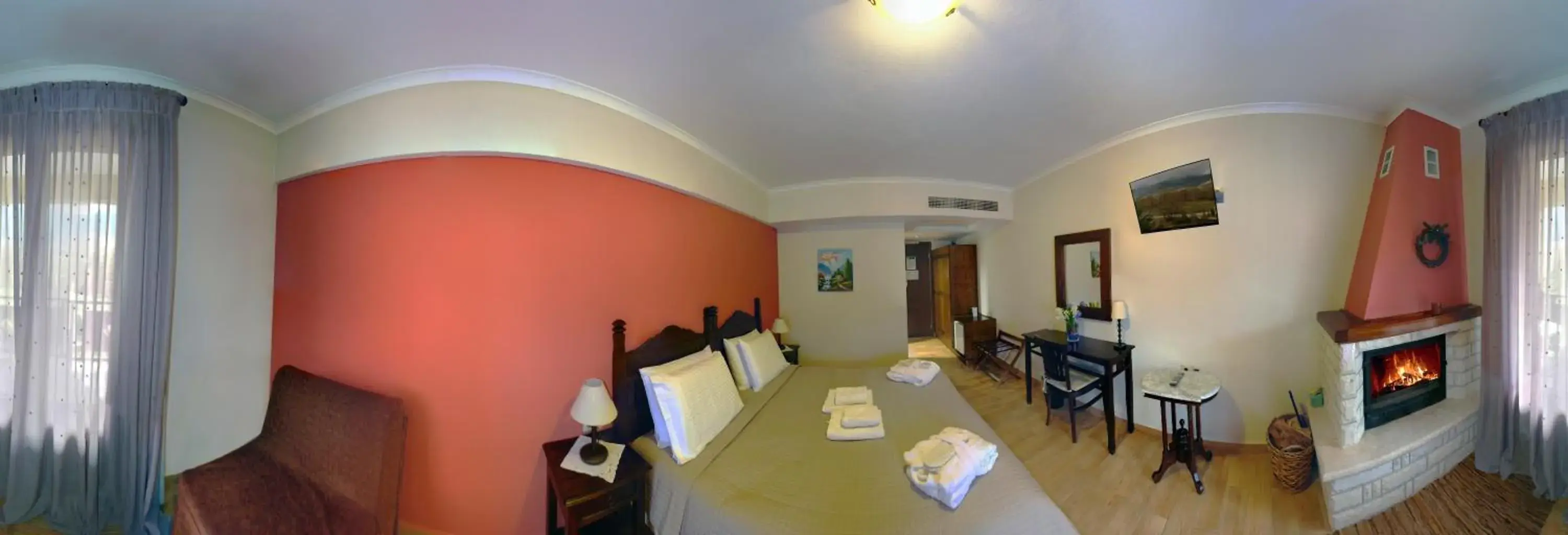 Deluxe Double or Twin Room with Fireplace in Melegos Inn Hotel Deluxe Double or Twin Room with Fireplace in Melegos Inn Hotel