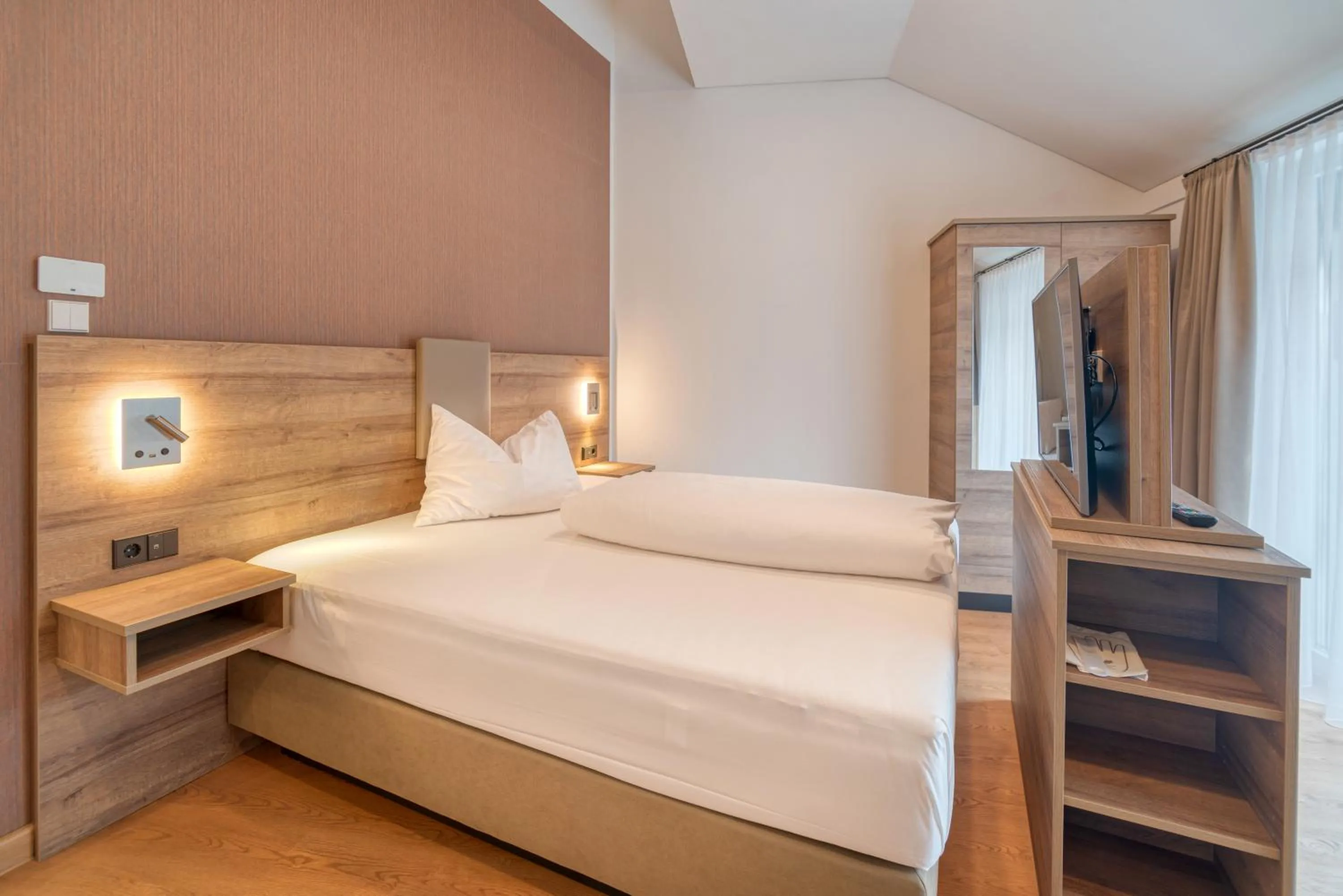 Bed in WESTSIDE Hotel