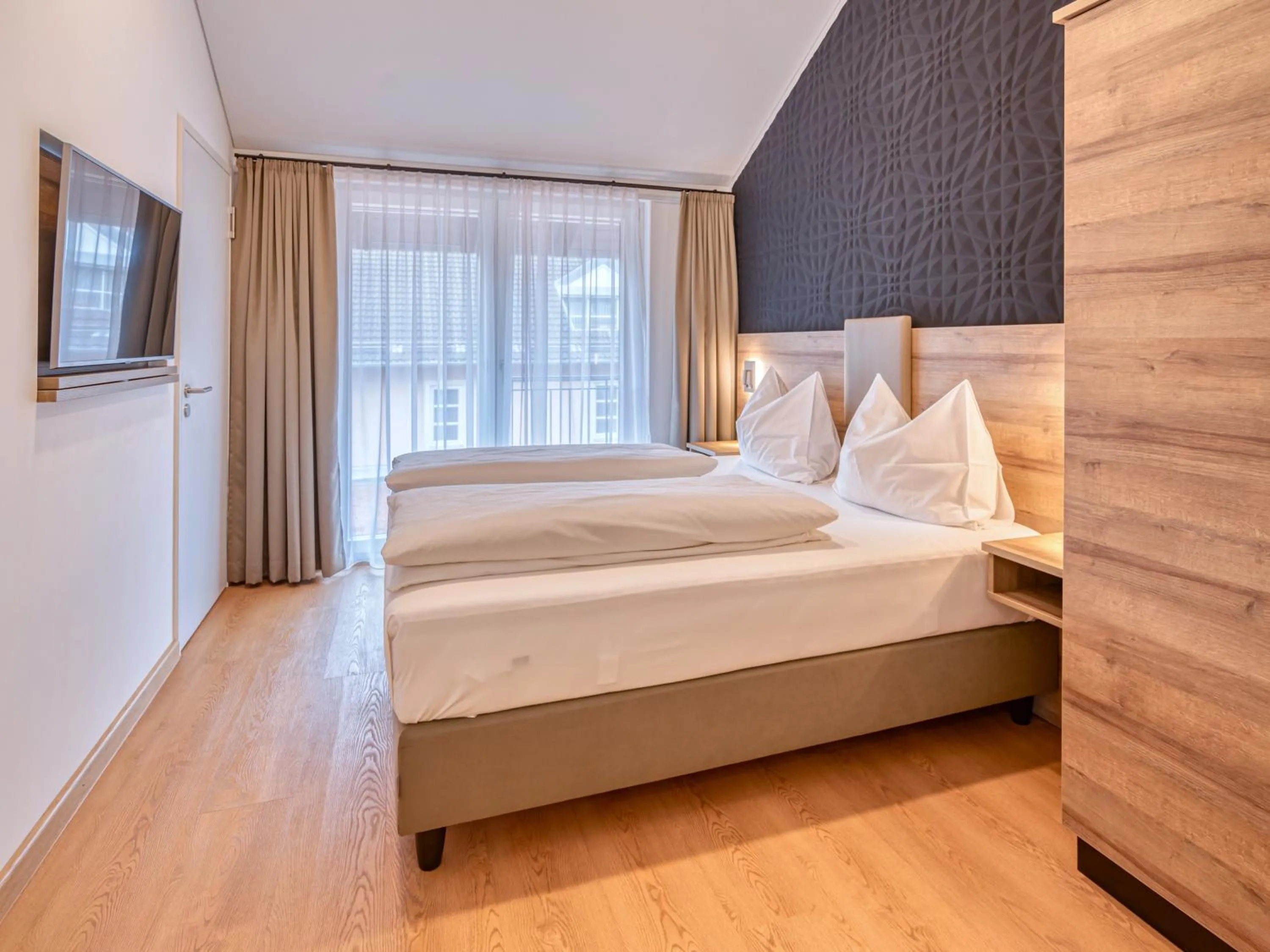 Bed in WESTSIDE Hotel