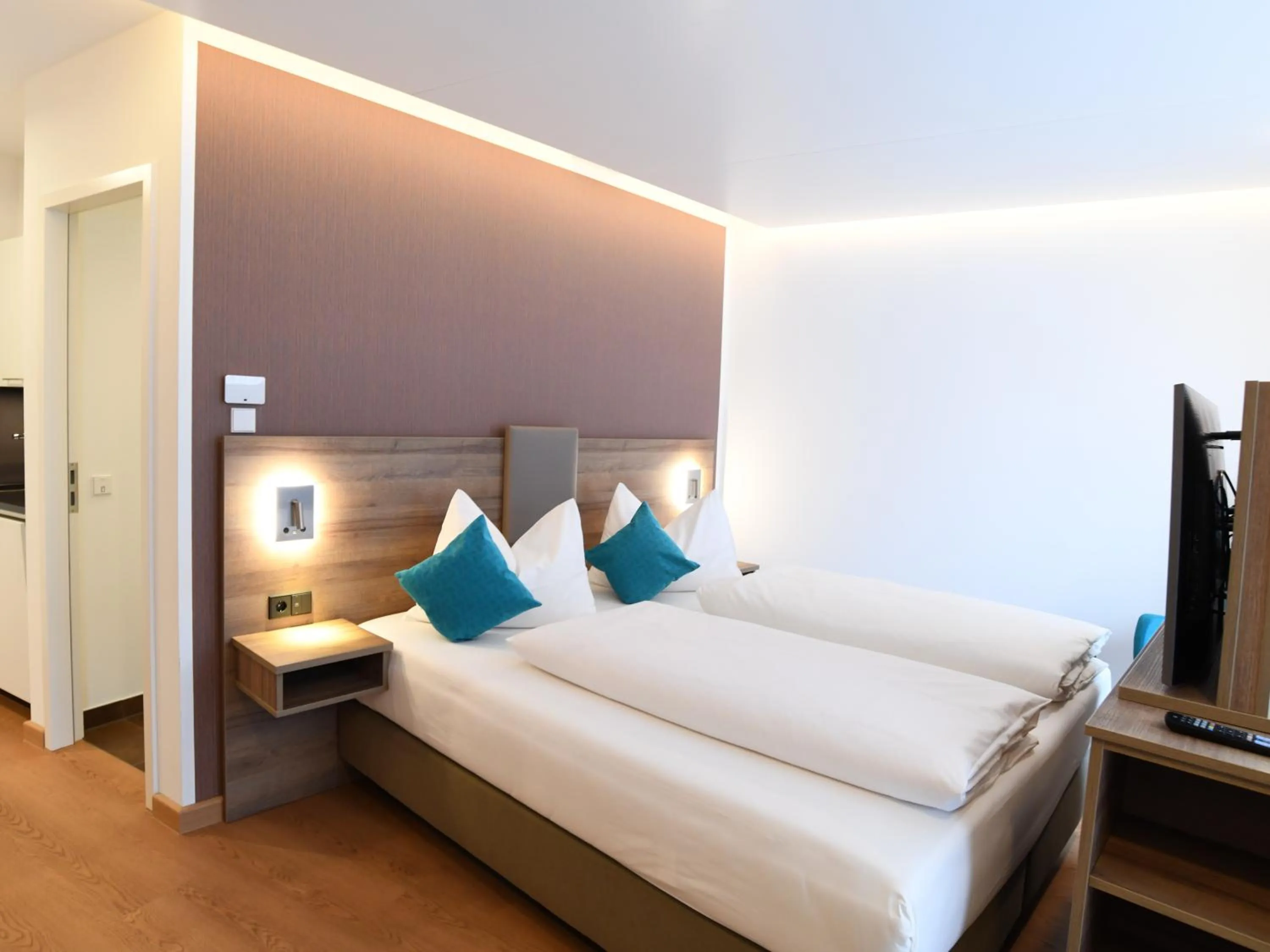 Bed in WESTSIDE Hotel