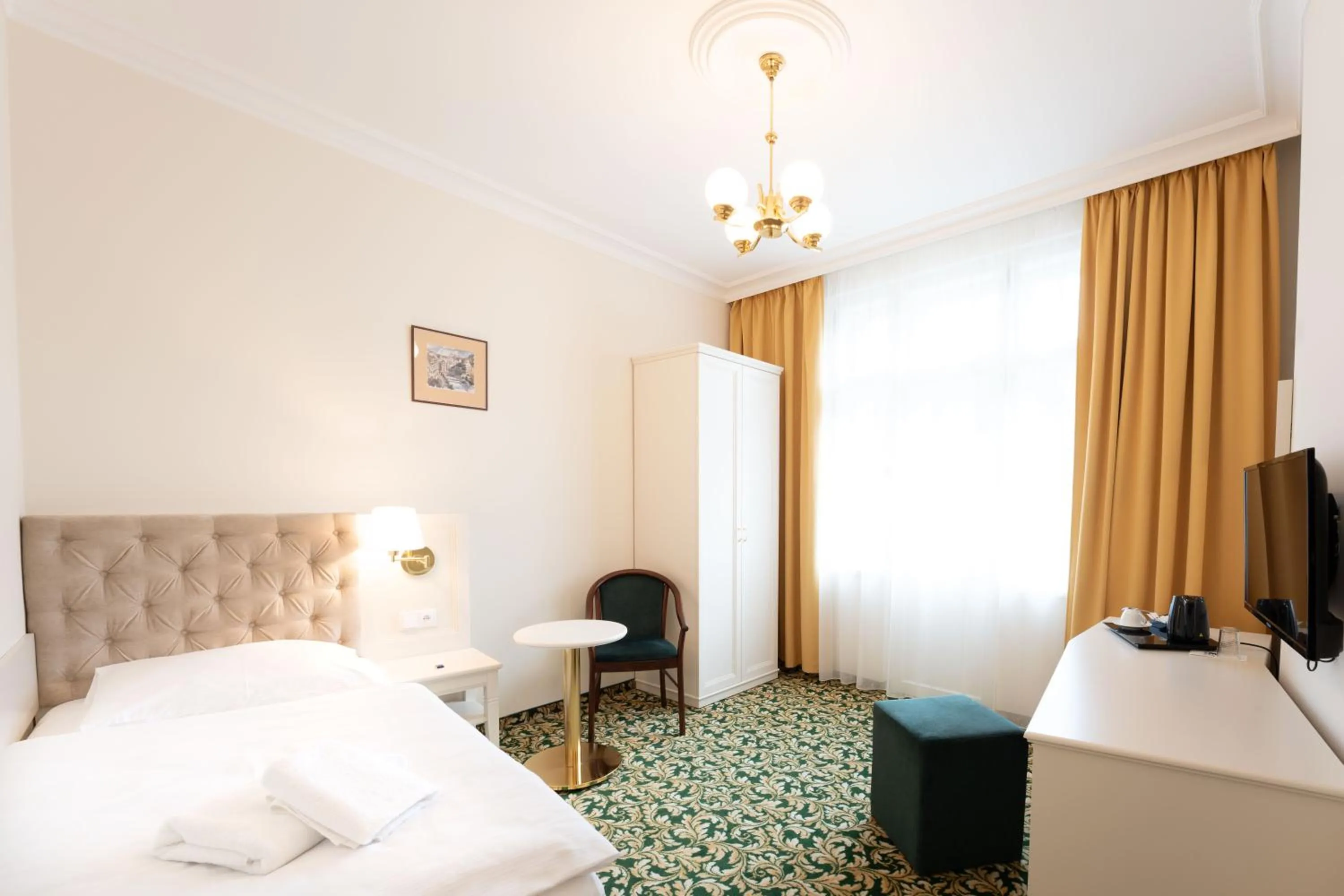 Bed in EA Hotel Elefant