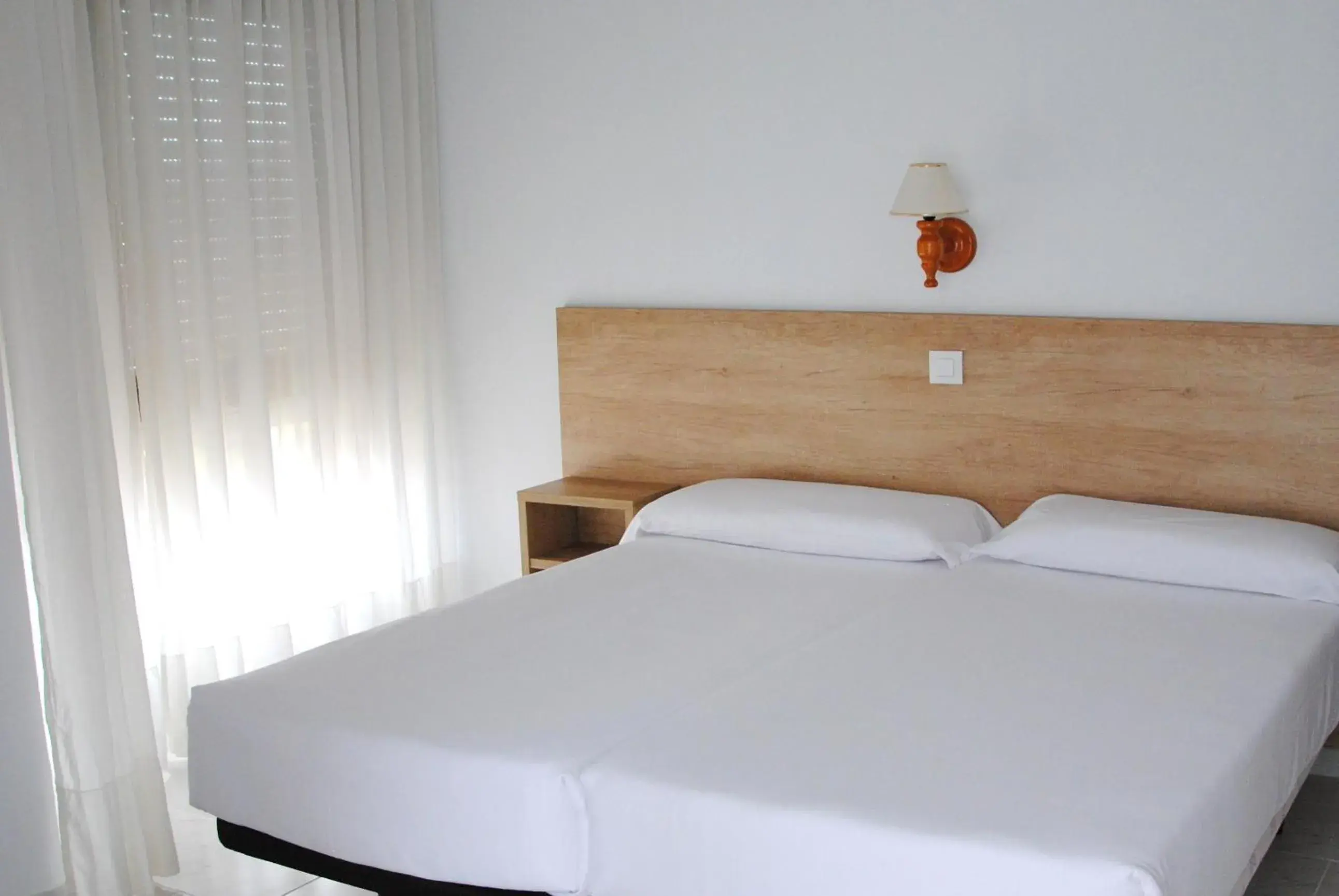 Bedroom in Apartamentos Regollera Bedroom in Apartamentos Regollera