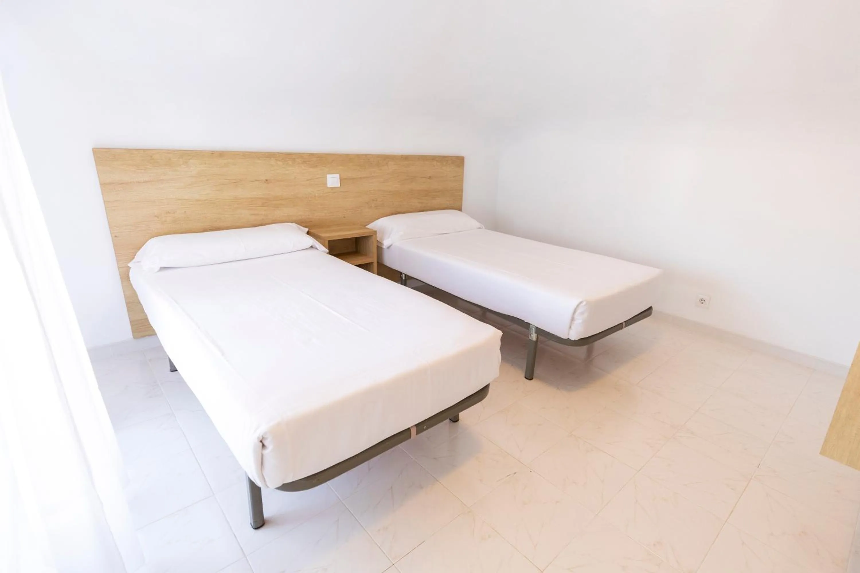 Bedroom in Apartamentos Regollera