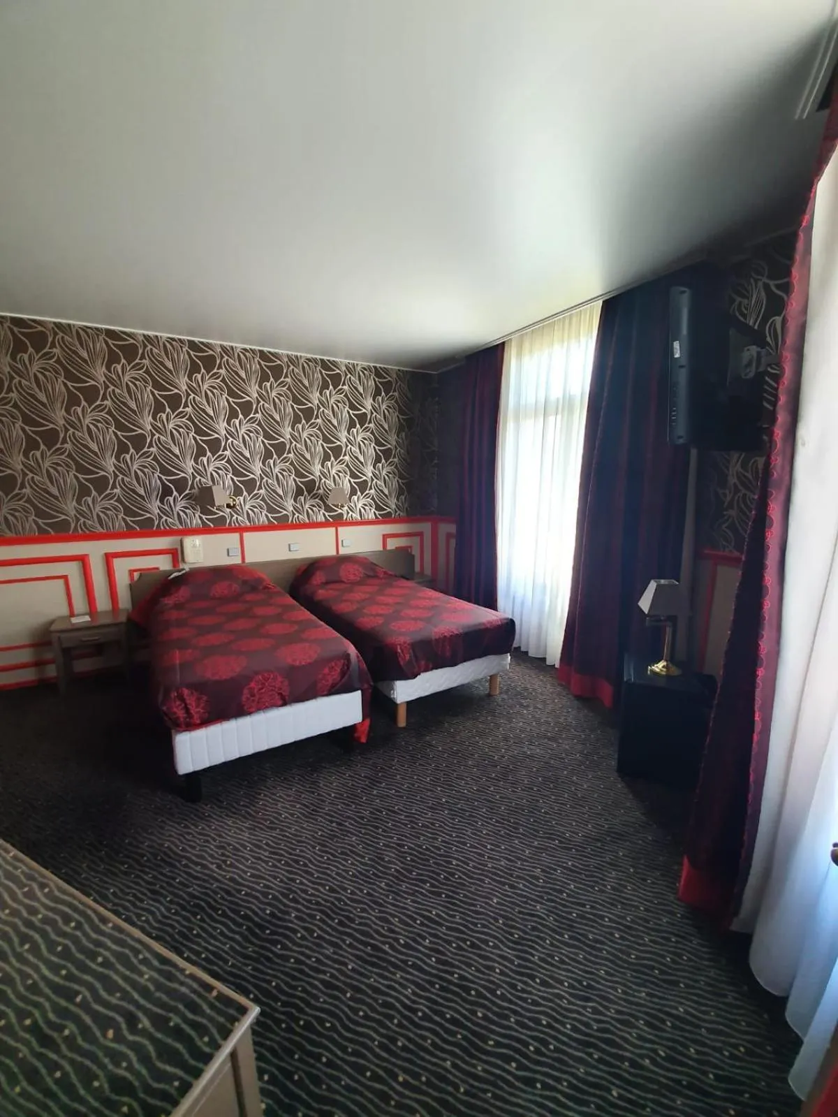 Bed in Grand Hôtel de Valenciennes