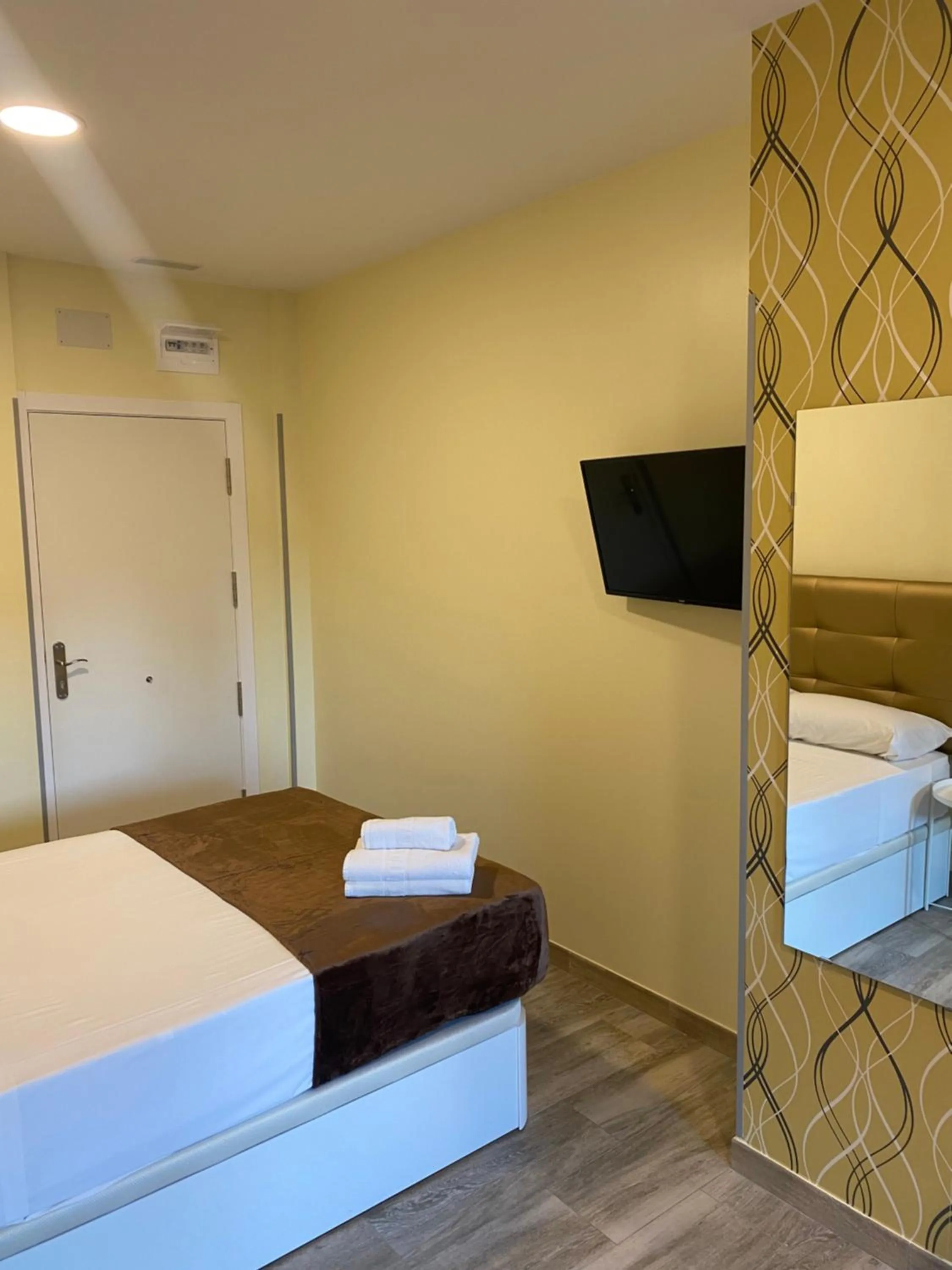 Bed in Hostal Alaska