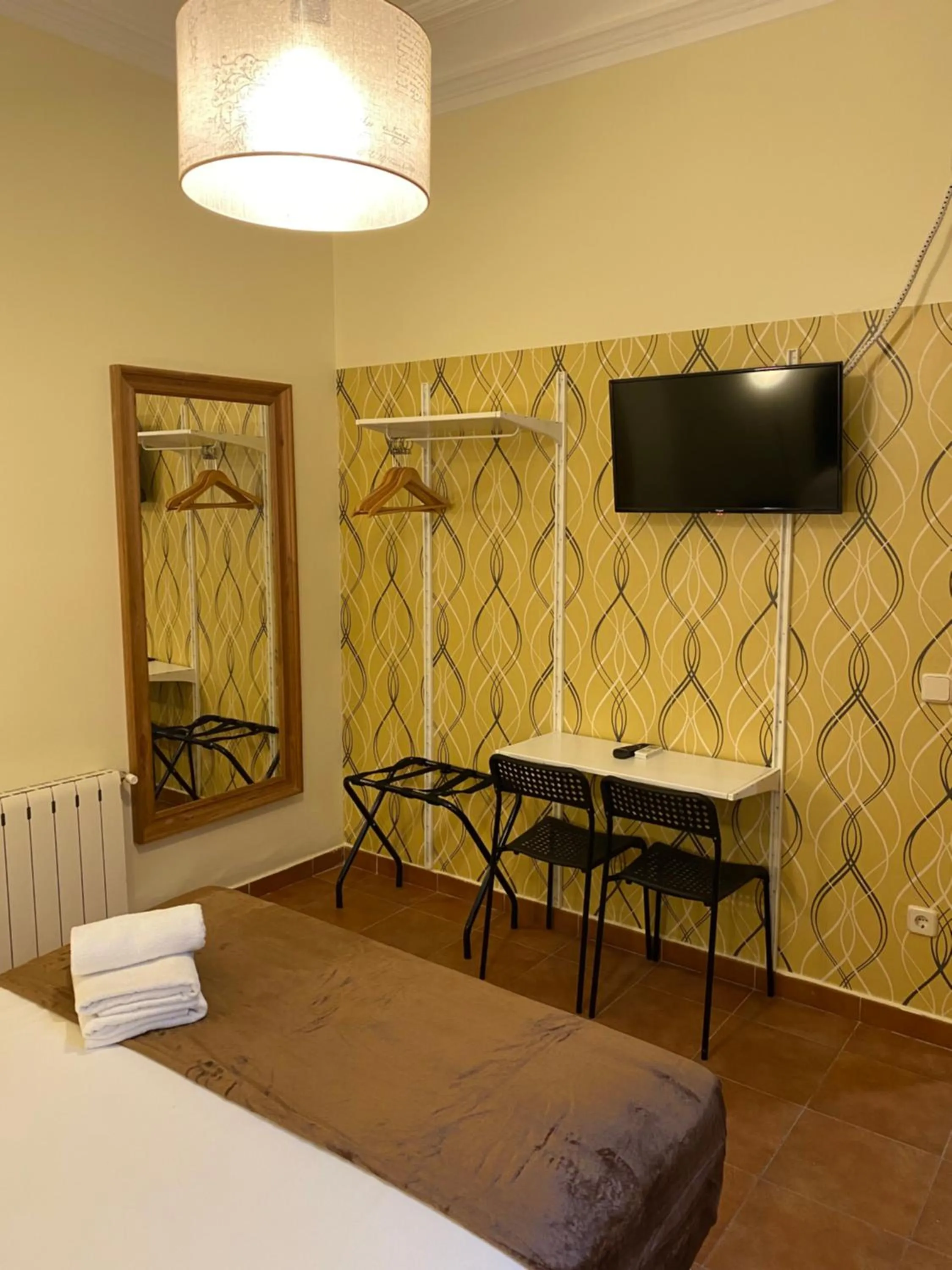 Bed in Hostal Alaska