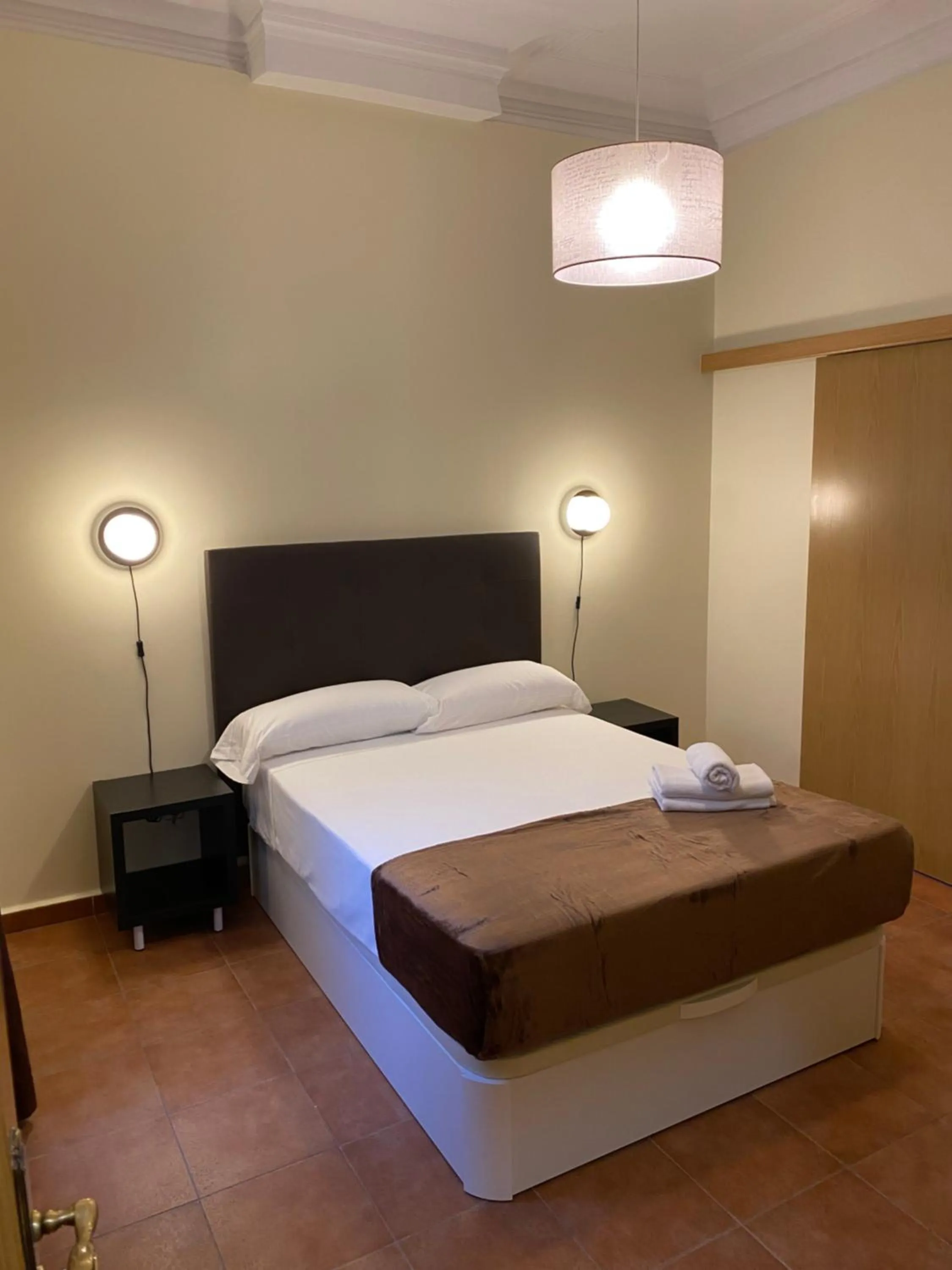 Bed in Hostal Alaska