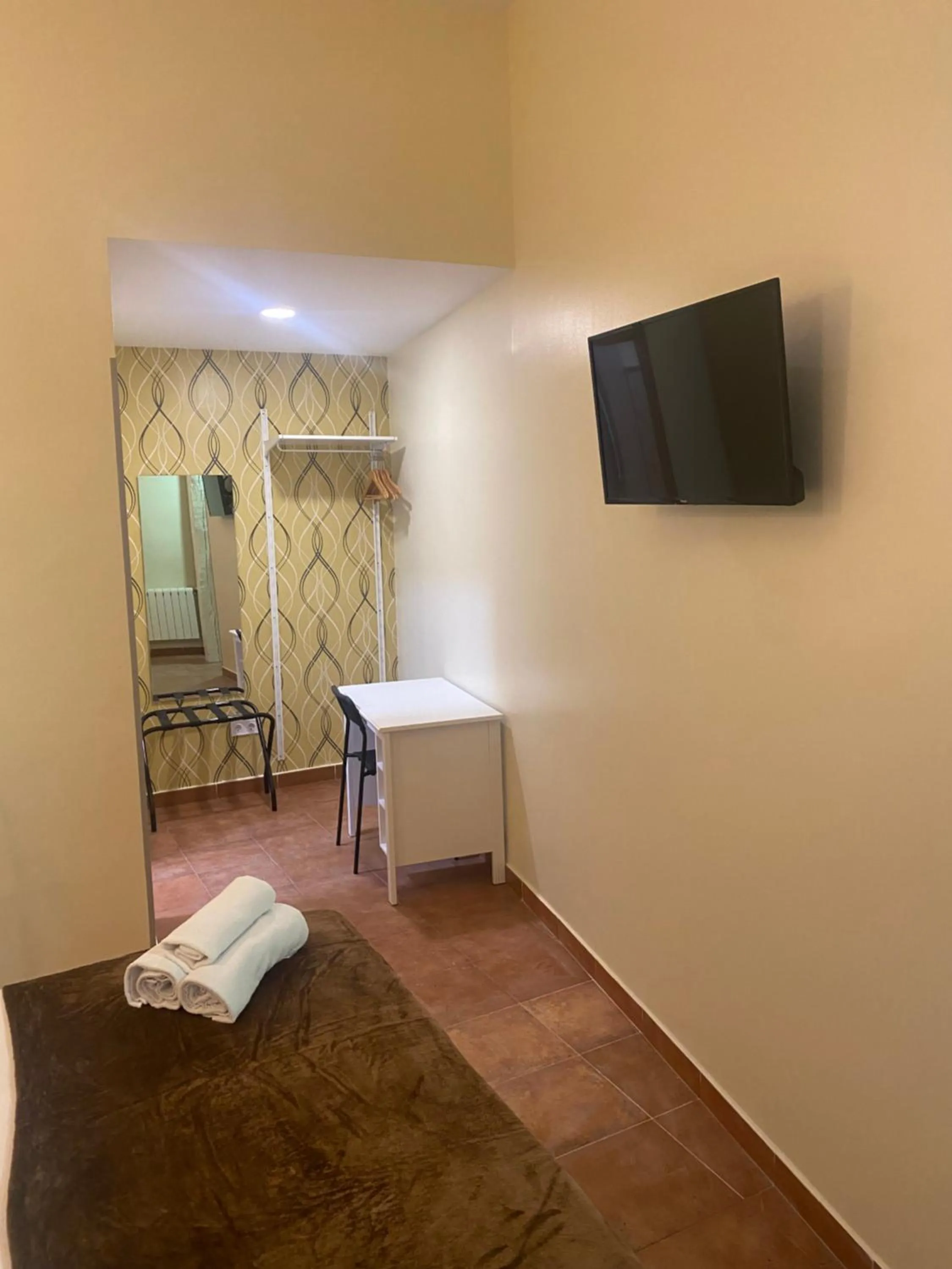 Bed in Hostal Alaska