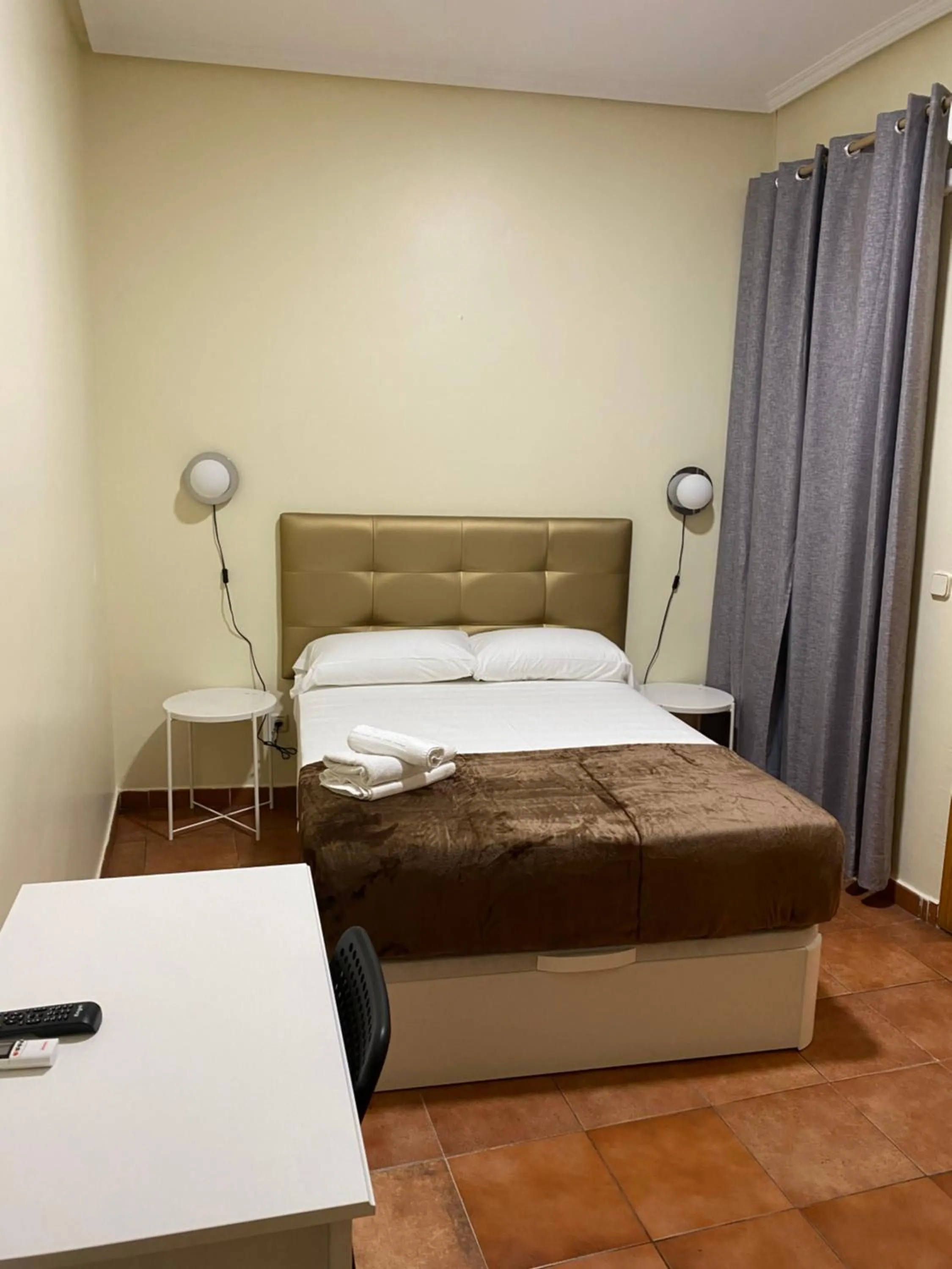 Bed in Hostal Alaska