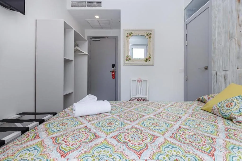 Bed in Hotel Clopy Rocamar