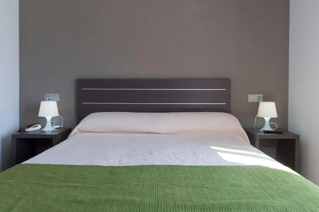 Bed in Hotel Clopy Rocamar