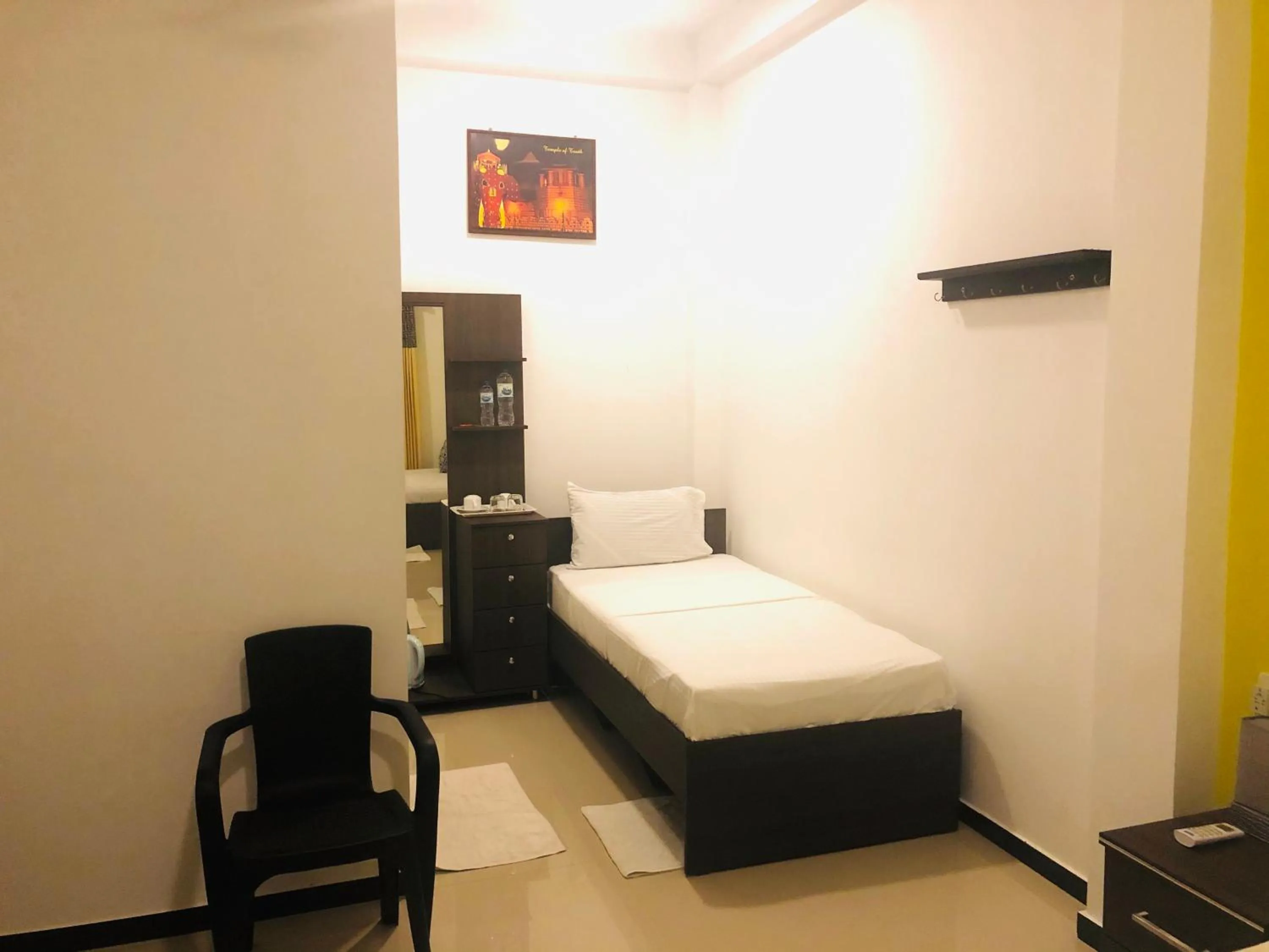 Bed in White Villa Airport Transit Hotel