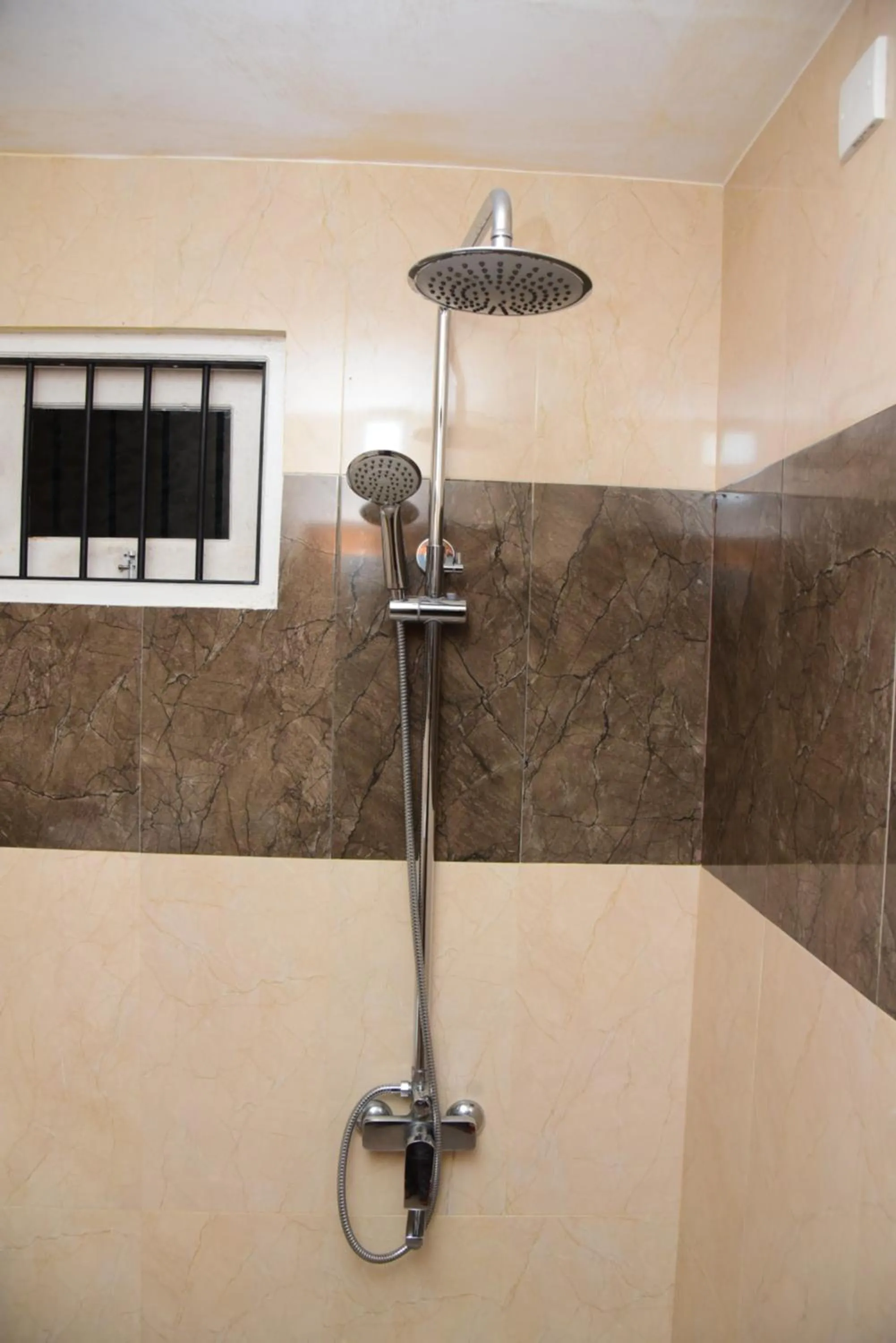 Shower in White Villa Airport Transit Hotel