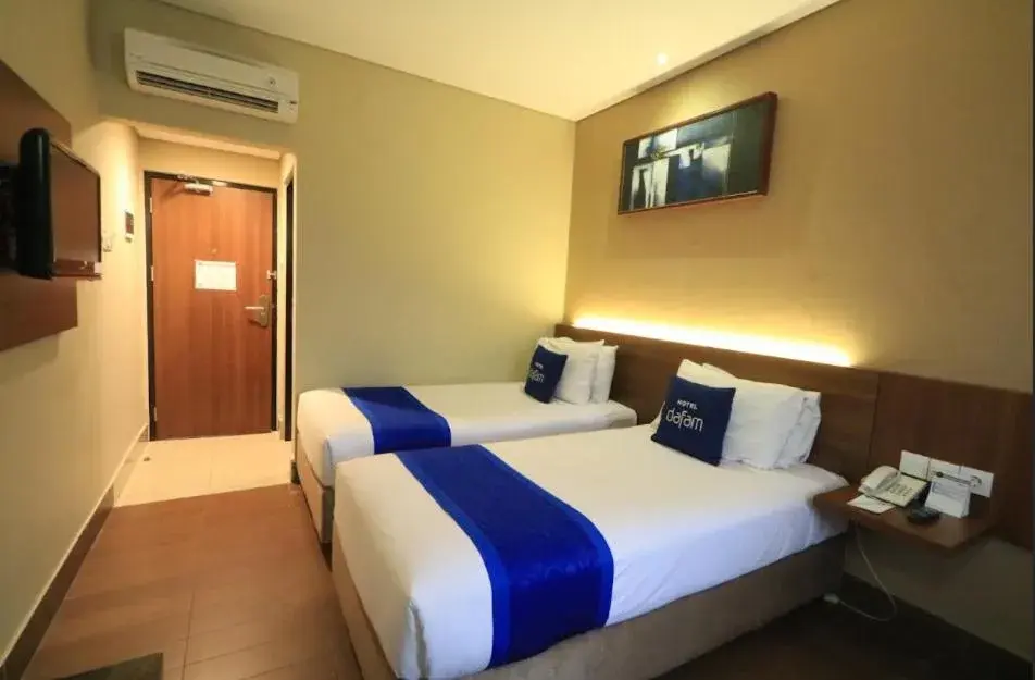Bed in Dafam Hotel Cilacap Bed in Dafam Hotel Cilacap