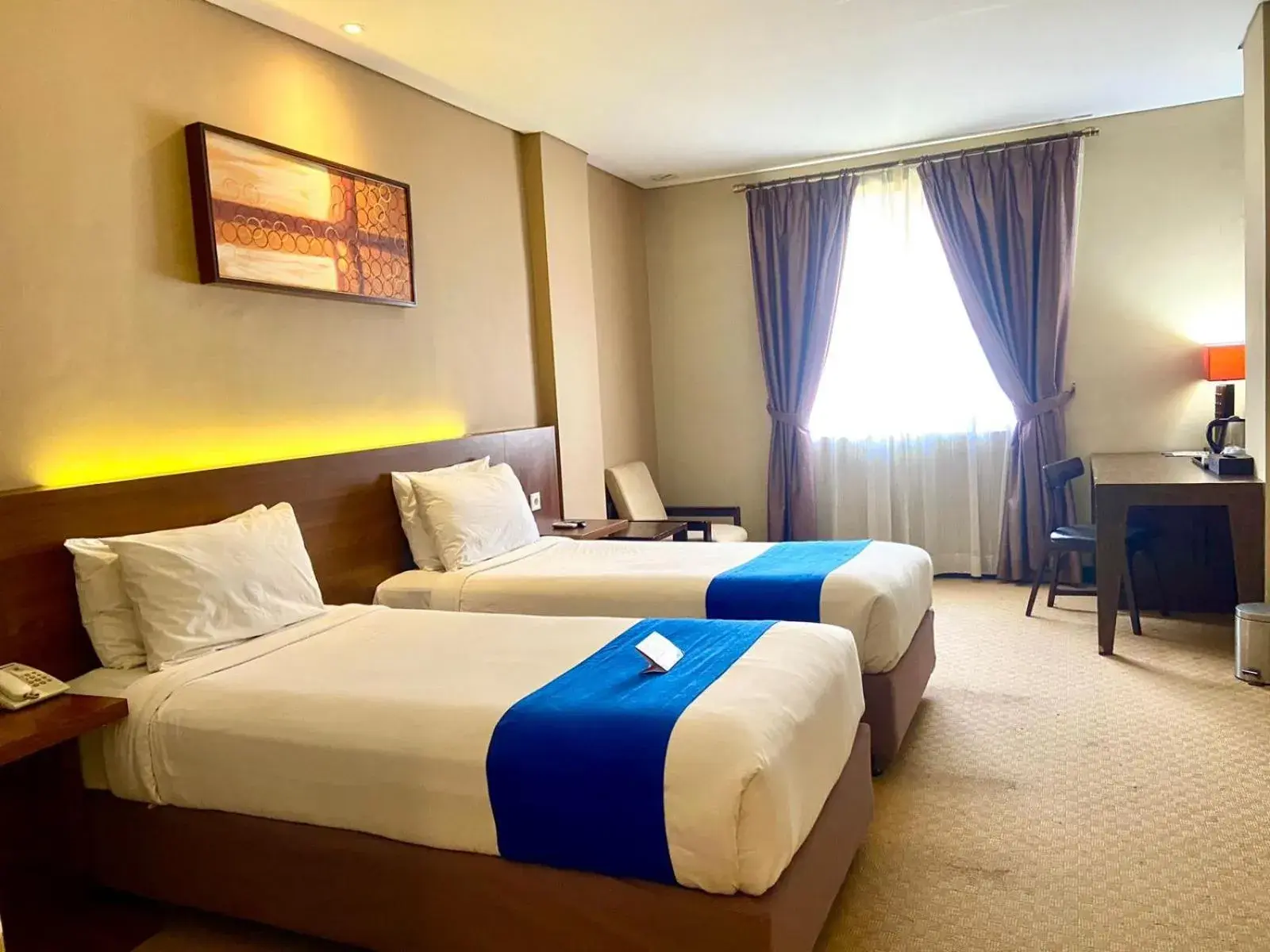 Bed in Dafam Hotel Cilacap Bed in Dafam Hotel Cilacap