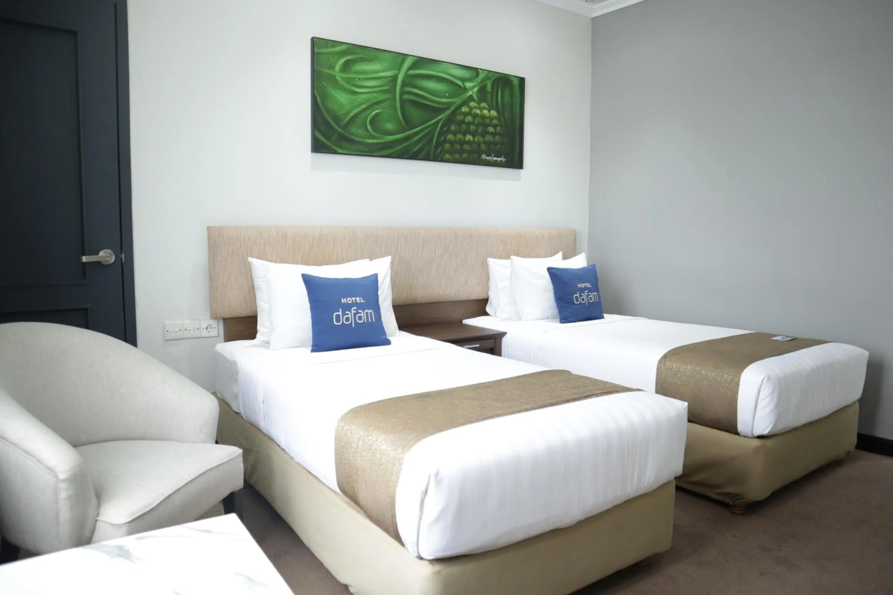 Bed in Hotel Dafam Semarang