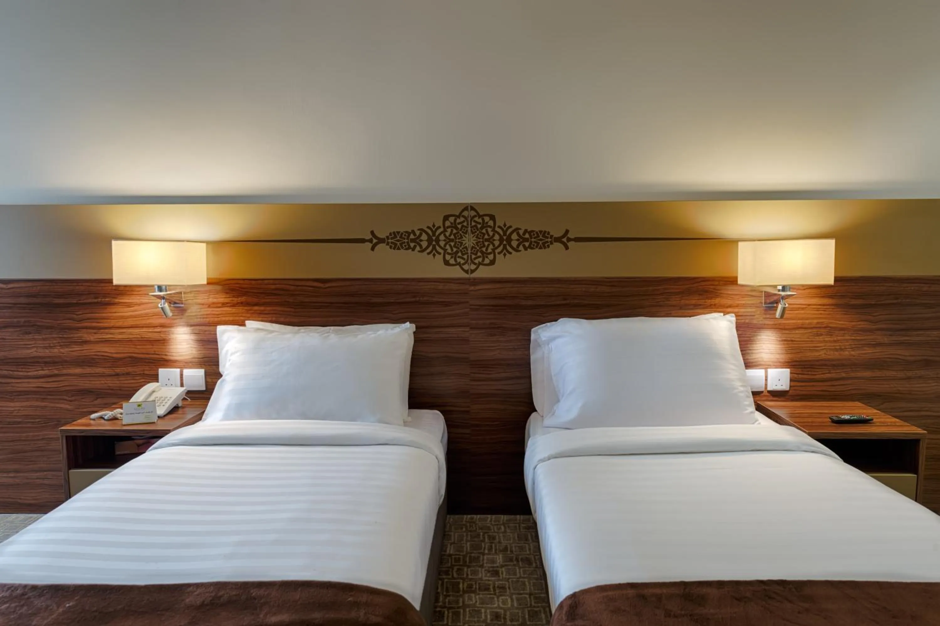 Bedroom in Snaf Inn ِAzizia Hotel