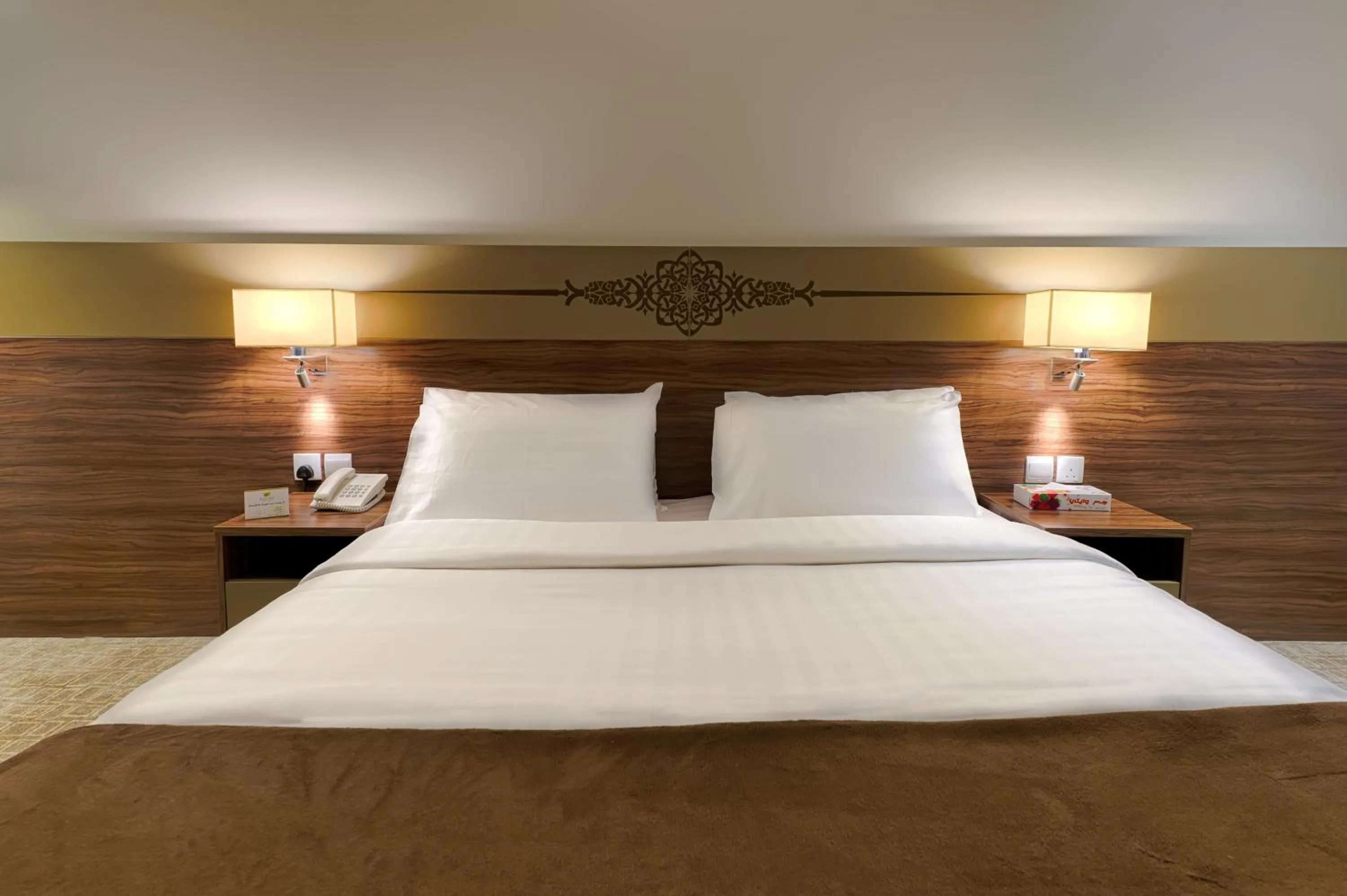 Bedroom in Snaf Inn ِAzizia Hotel