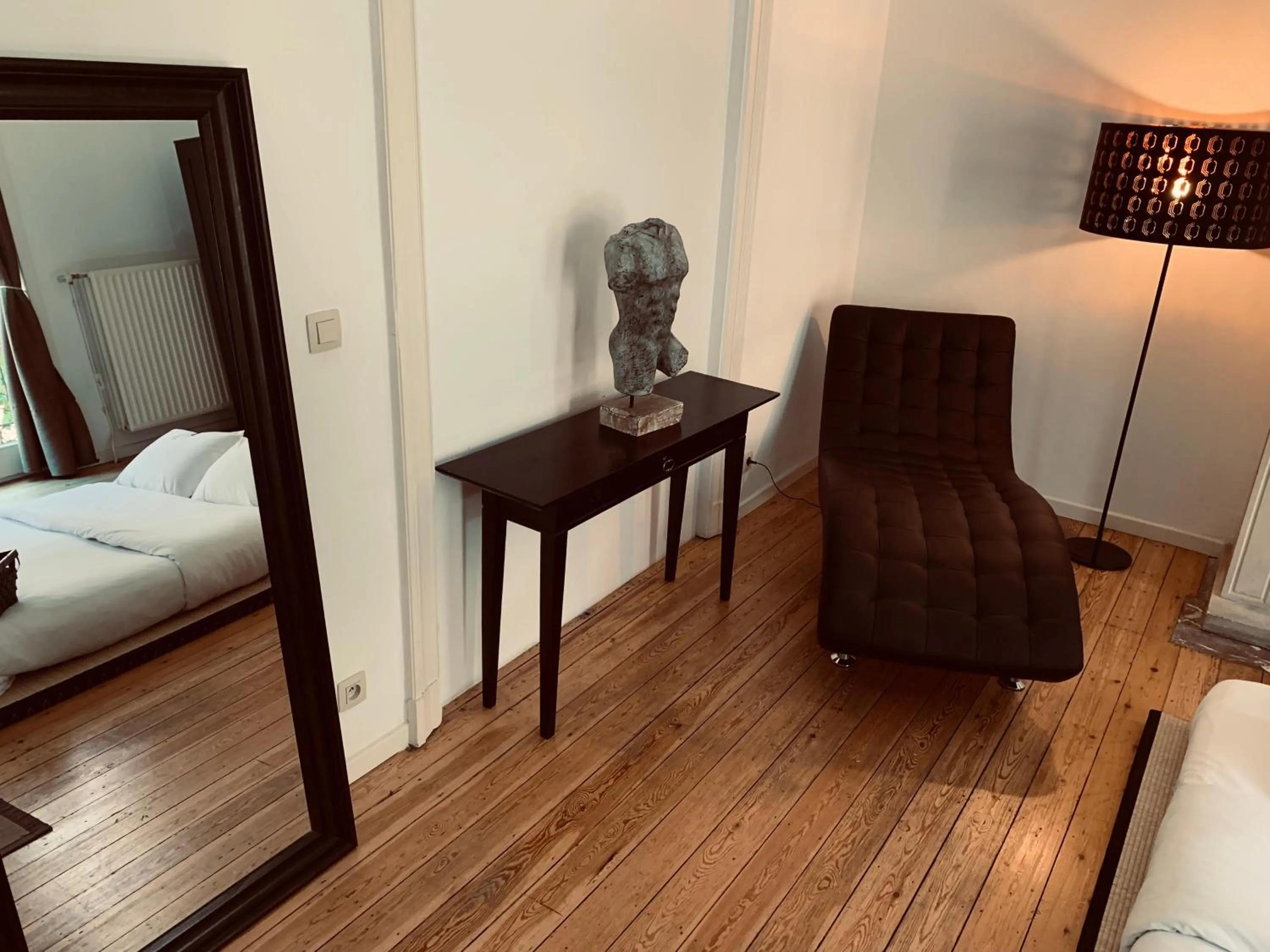 Seating area, Bed in Chic Cocoon Guest House